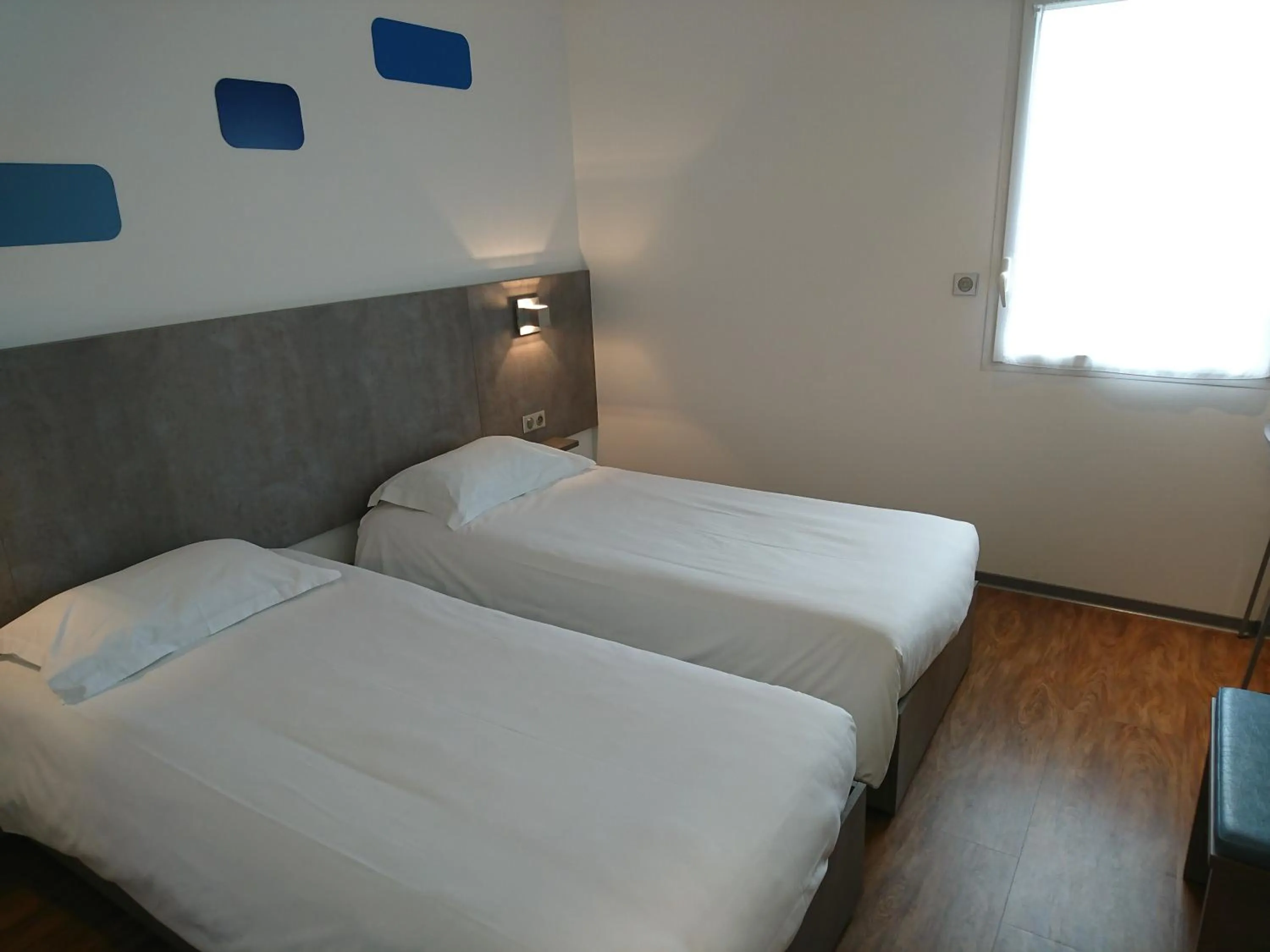 Bed in H24 HOTEL