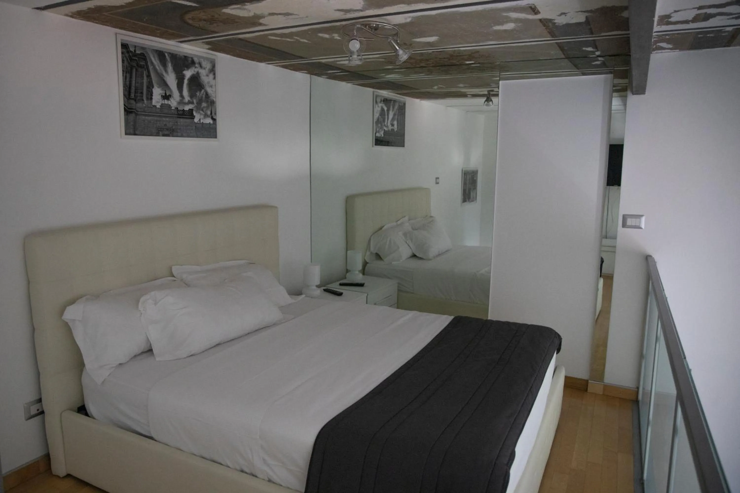 Photo of the whole room, Bed in Arch Rome Suites