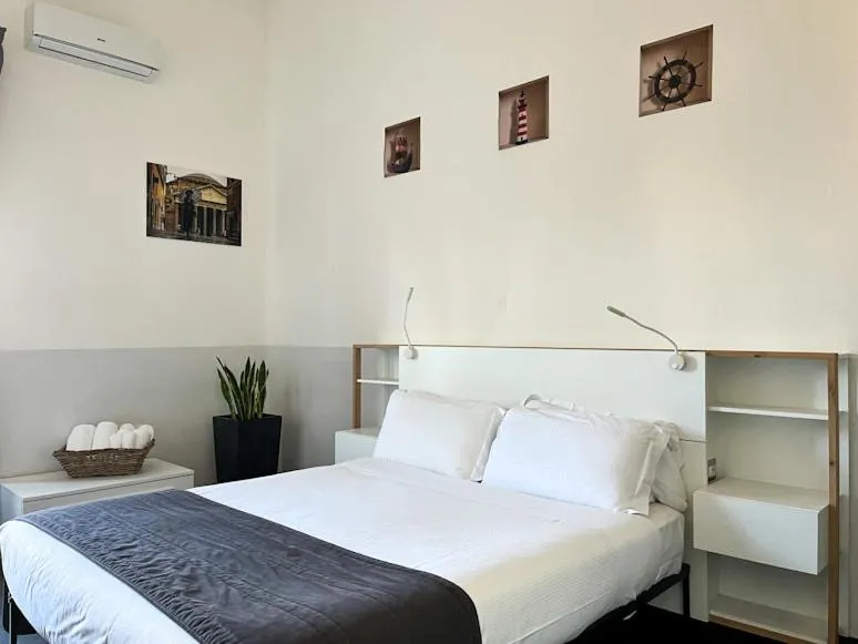 Bed in Arch Rome Suites