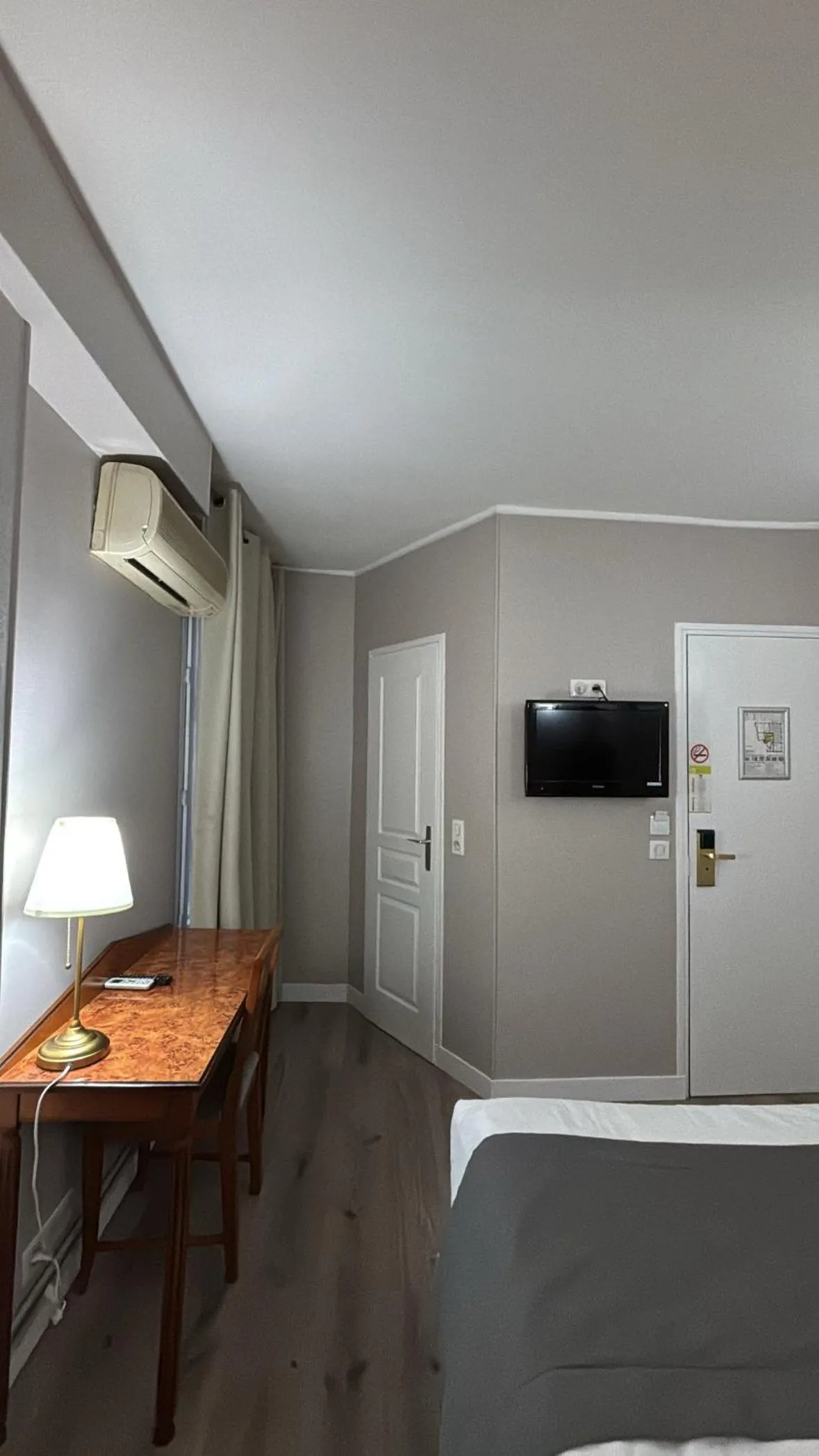 Communal lounge/ TV room, Bed in New Hôtel Gare Du Nord