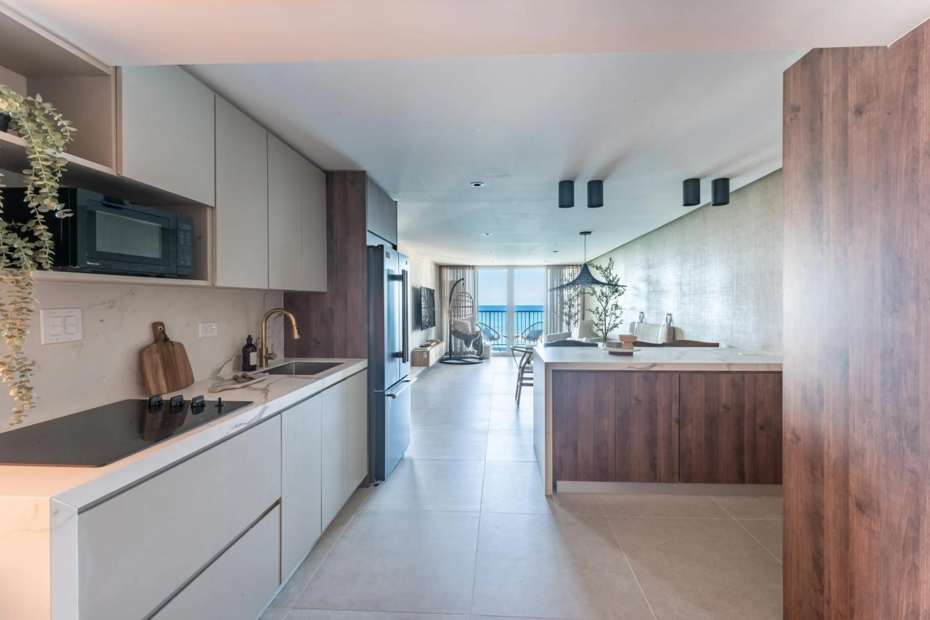 kitchen in OCEAN VIEW DELUXE SUITE: PVT. BEACH & POOL