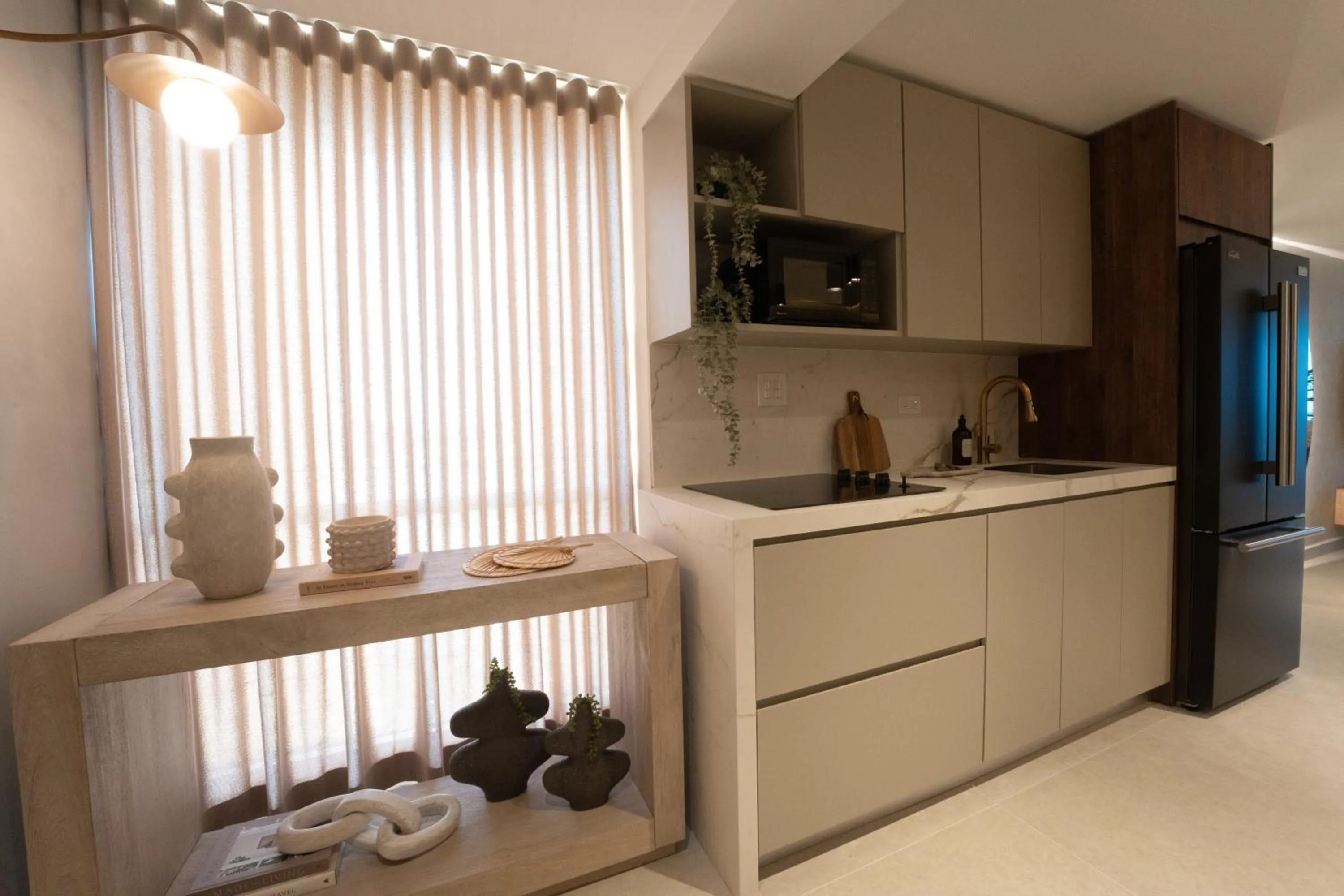 Kitchen or kitchenette in OCEAN VIEW DELUXE SUITE: PVT. BEACH & POOL