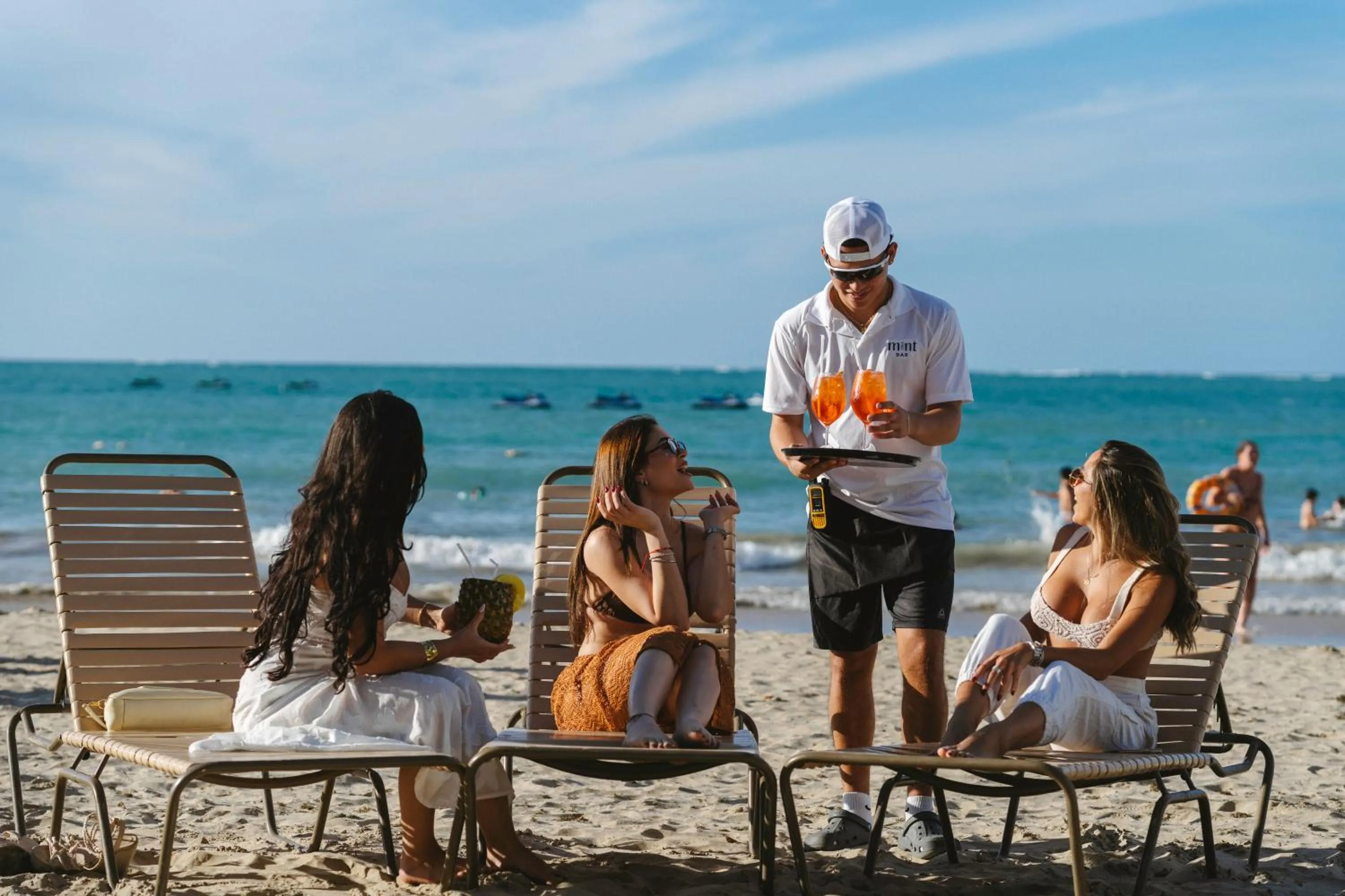 Lounge or bar in OCEAN VIEW DELUXE SUITE: PVT. BEACH & POOL