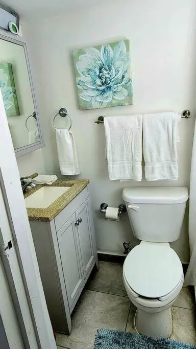 Bathroom in OCEAN VIEW DELUXE SUITE: PVT. BEACH & POOL