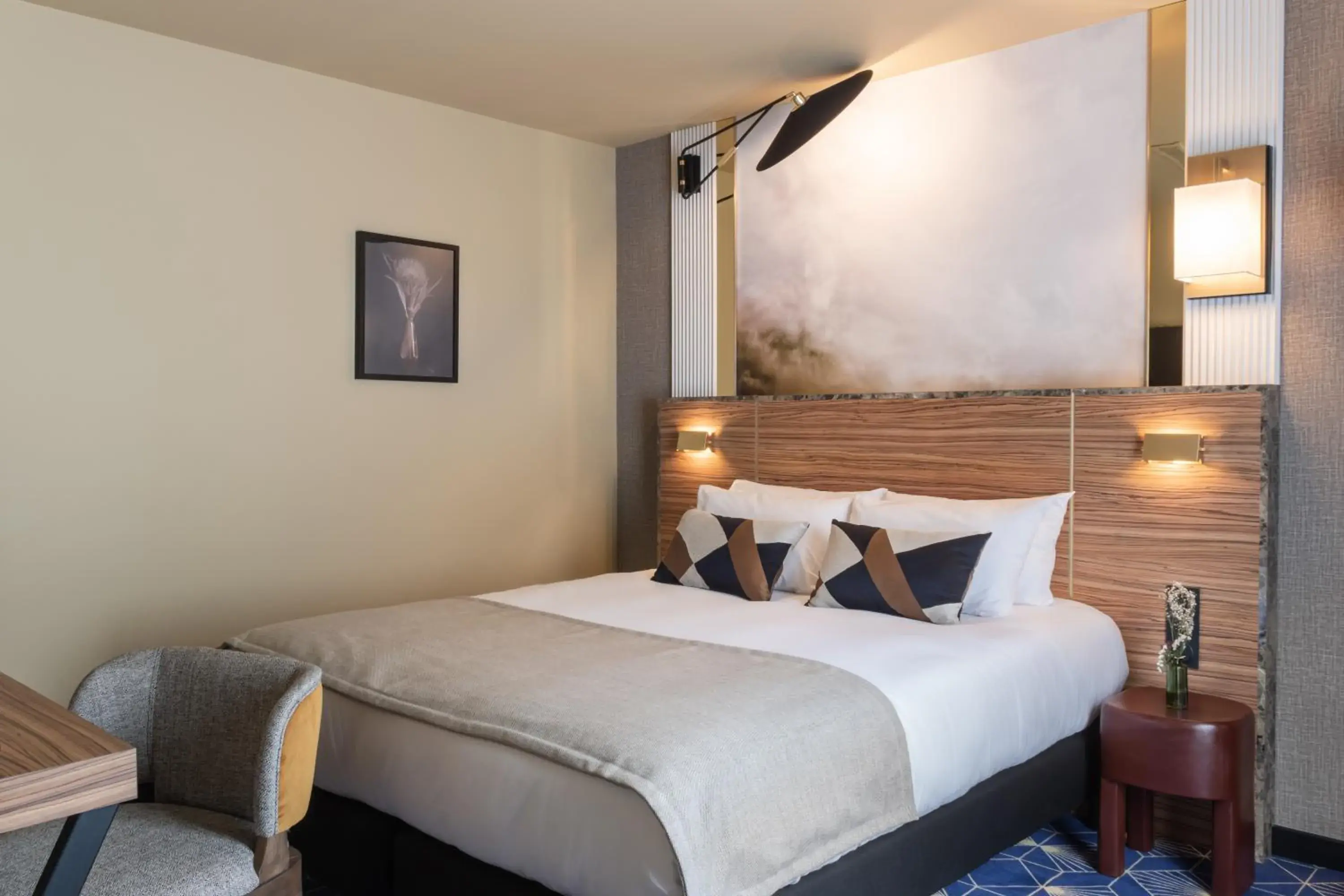 Bed in Hotel Le Rocroy Bed in Hotel Le Rocroy