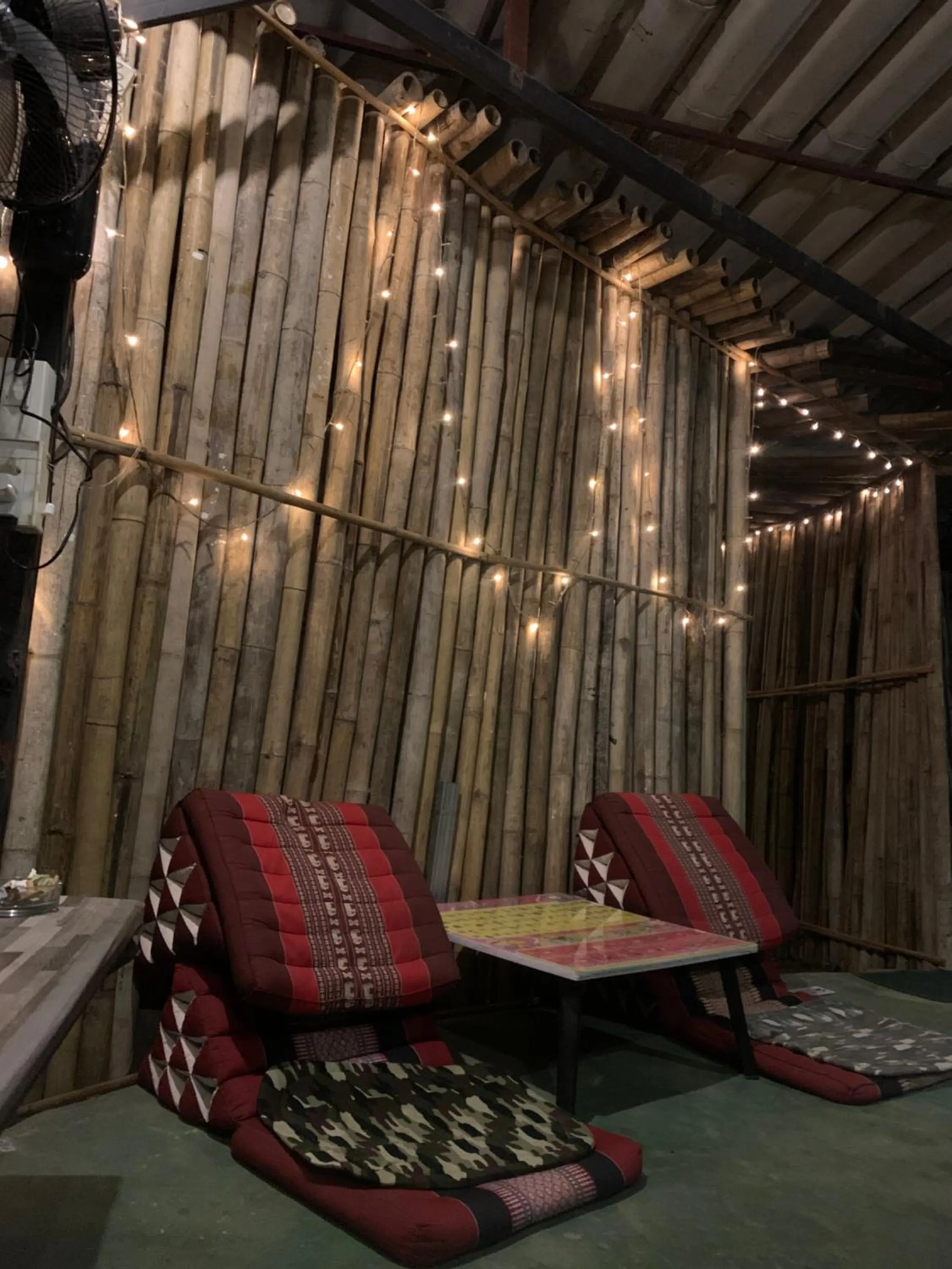 Seating area in Fundee Story Guesthouse Bamboo House in Chiang mai old town