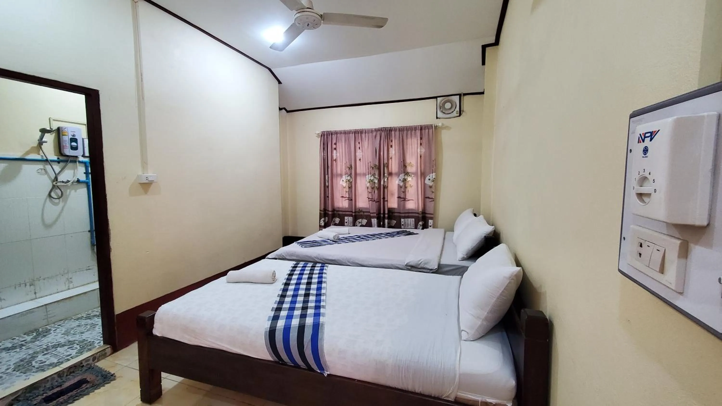 Bed in Pakbeng Guesthouse