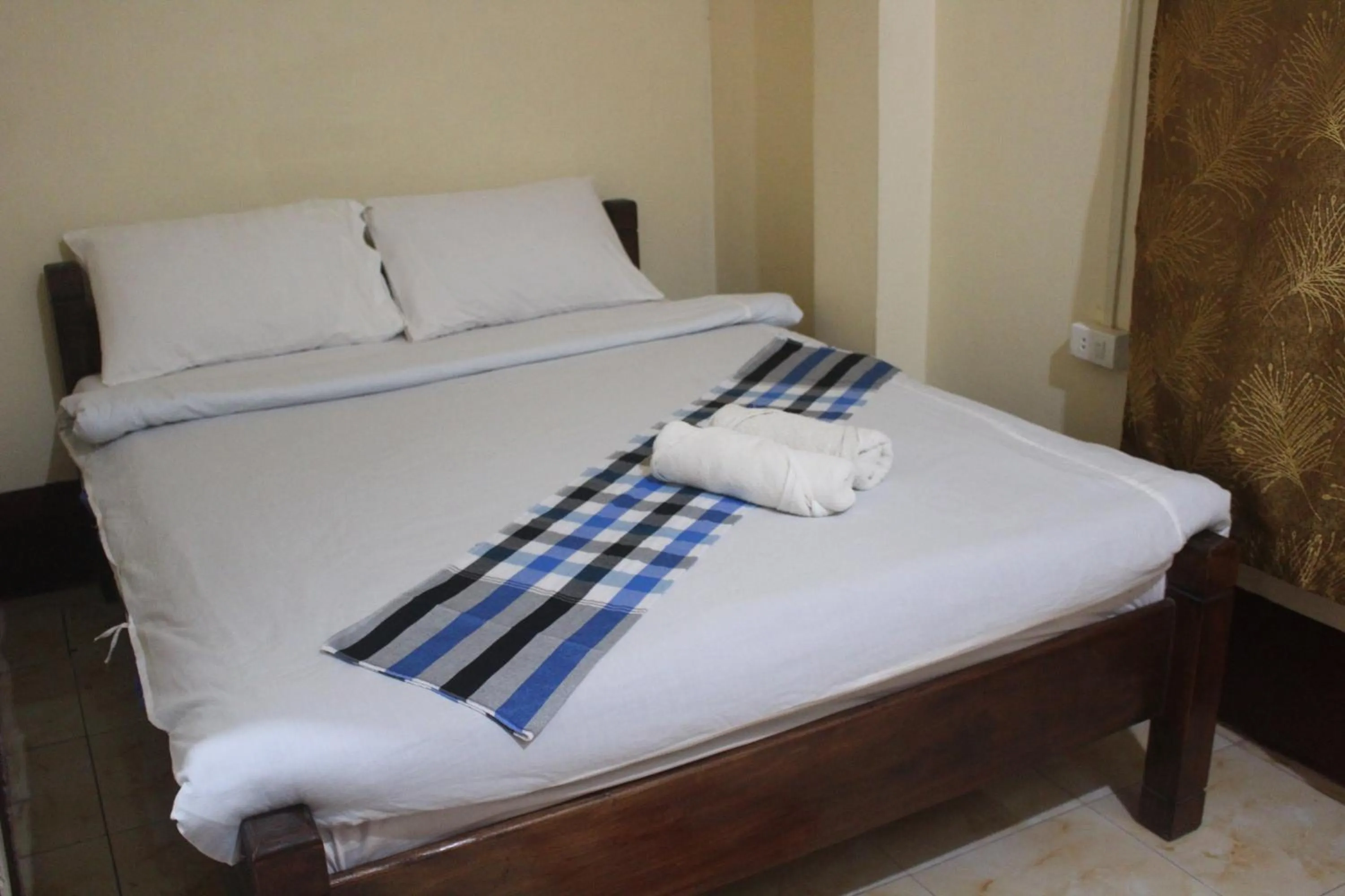 Bed in Pakbeng Guesthouse