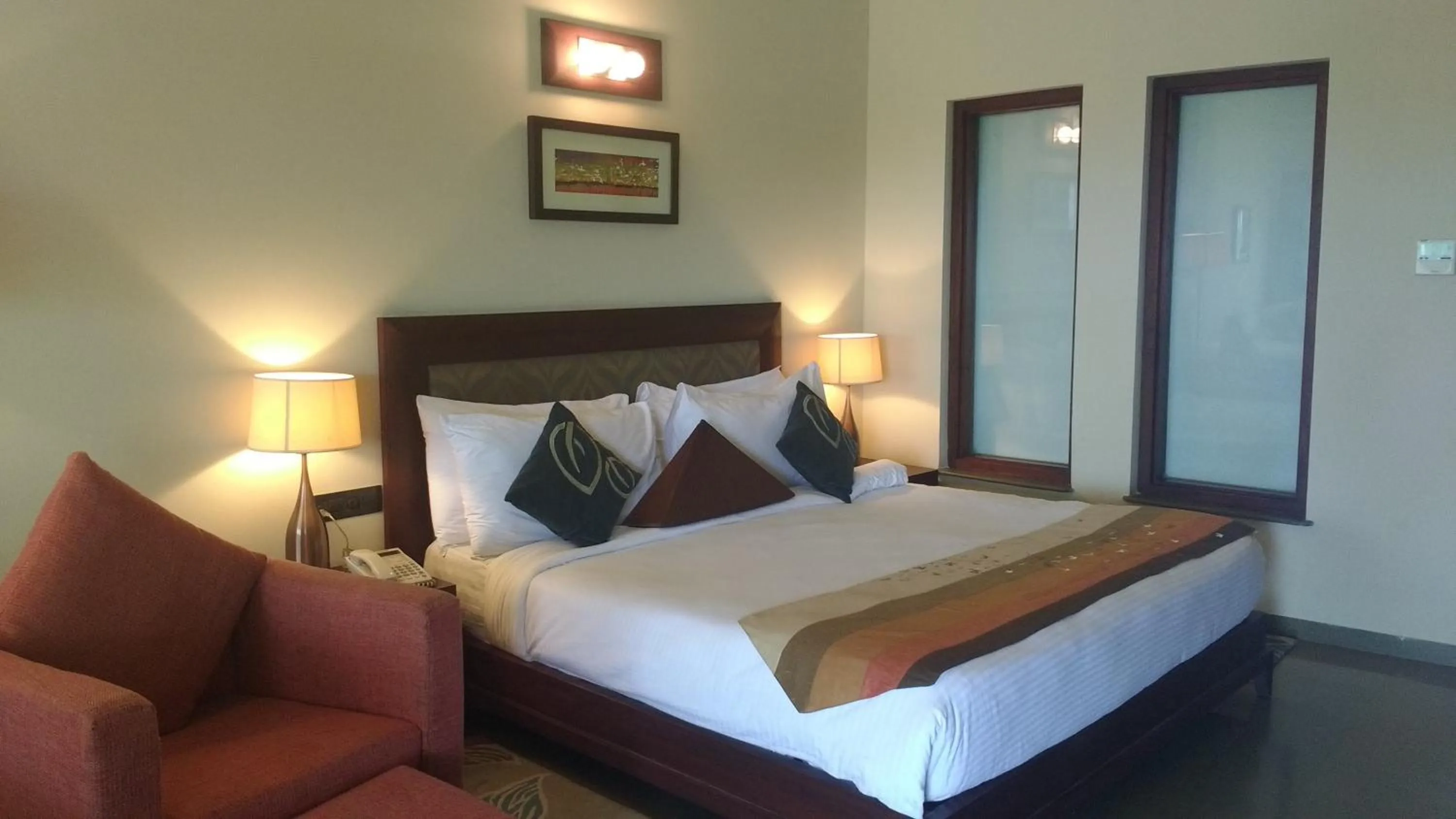 Photo of the whole room, Bed in Gulmohar Greens Golf & Country Club