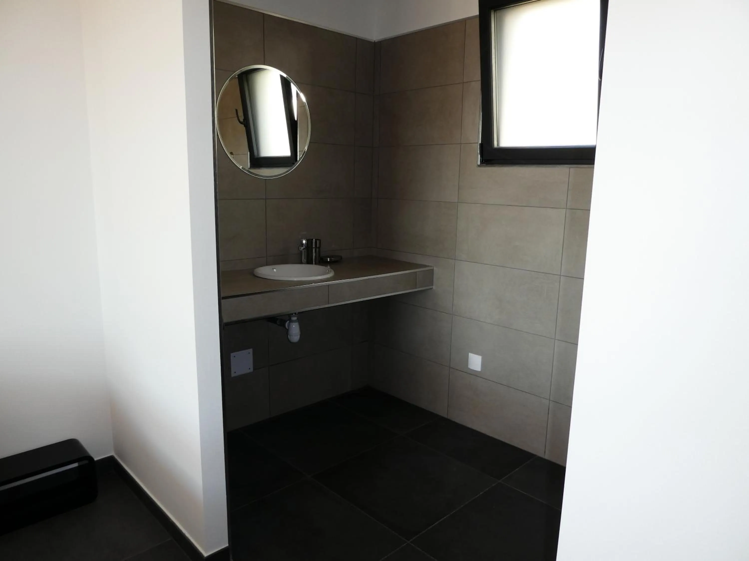 Bathroom in Résidence Les Jardins du Fort