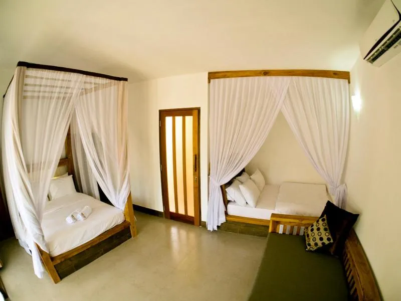 Bed in Gili Air Bungalows