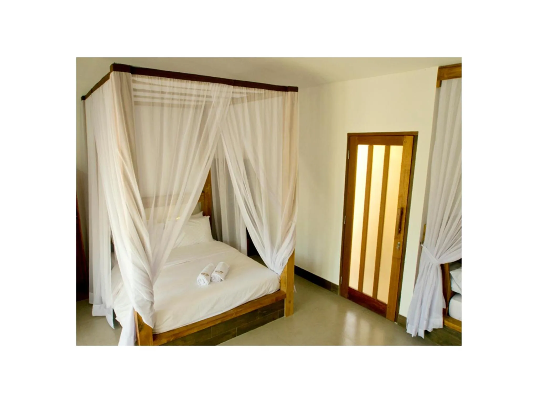 Bed in Gili Air Bungalows