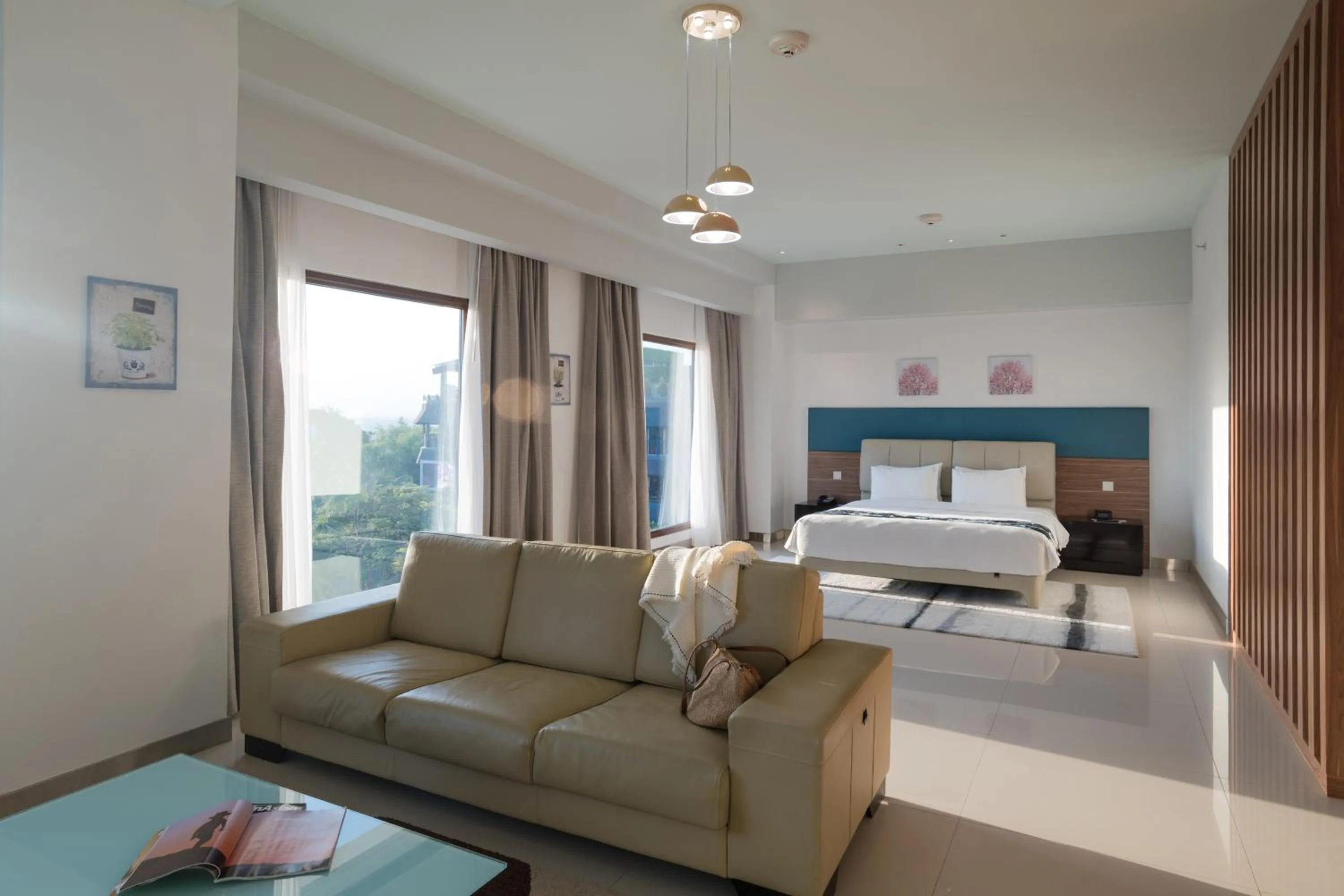 Living room, Bed in Holiday Inn Express Baruna by IHG