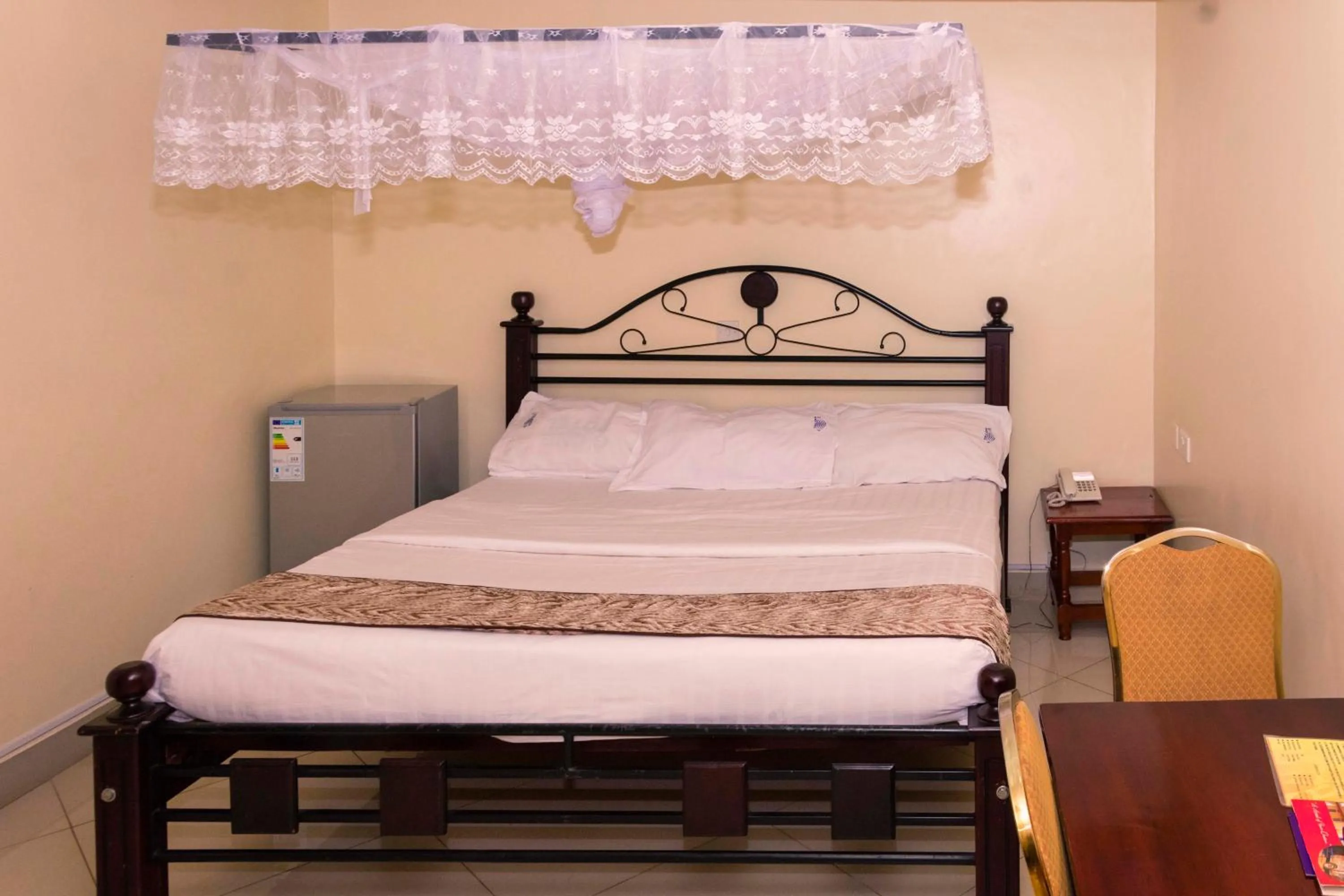 Bed in G-One Hotel Kampala