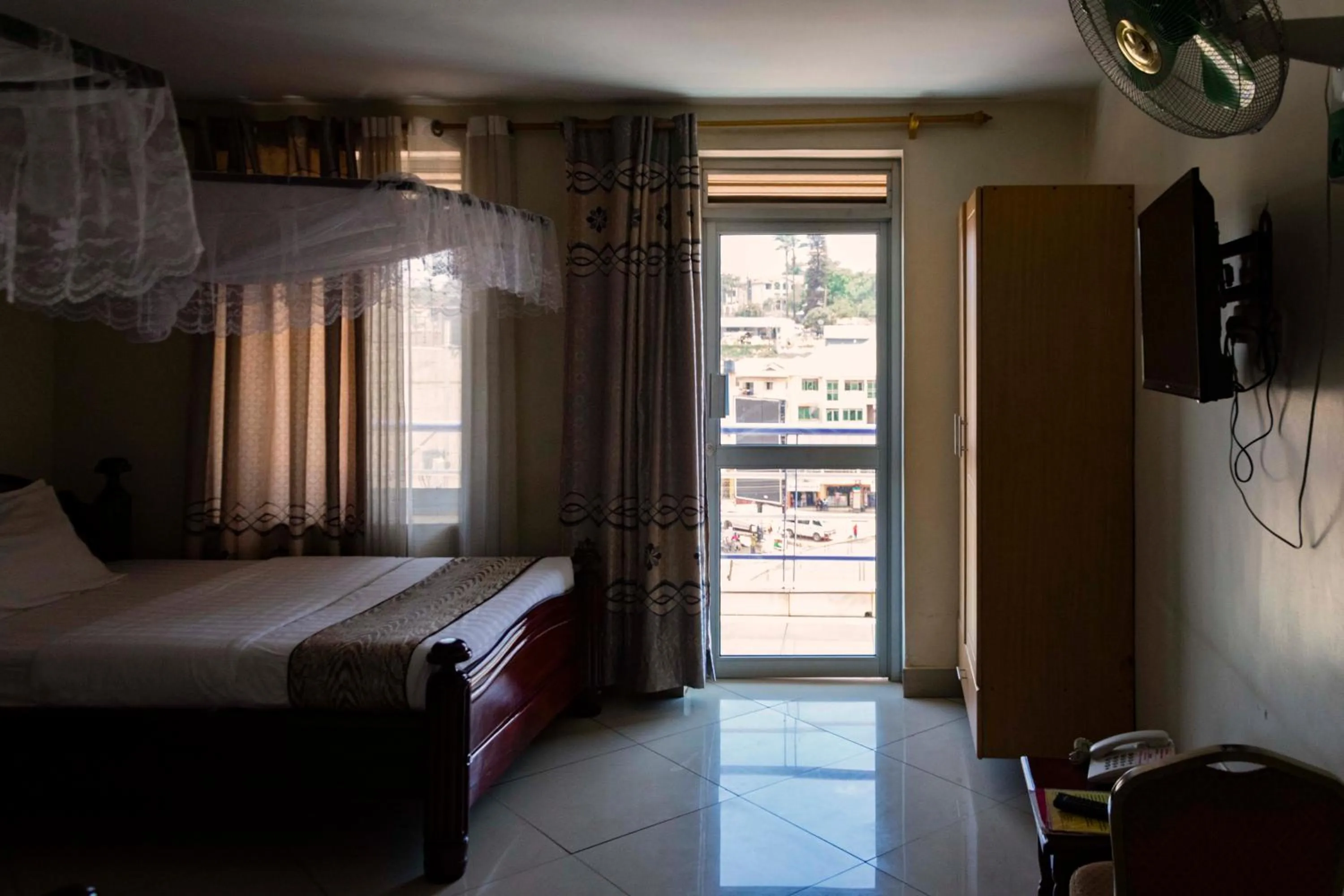 Photo of the whole room, Bed in G-One Hotel Kampala