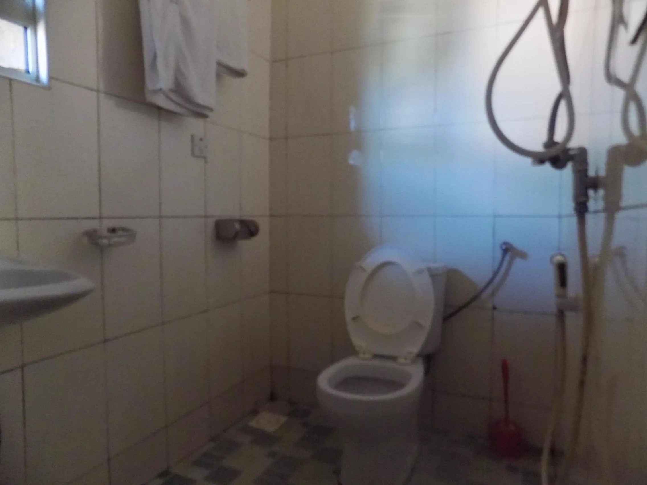 Toilet in G-One Hotel Kampala