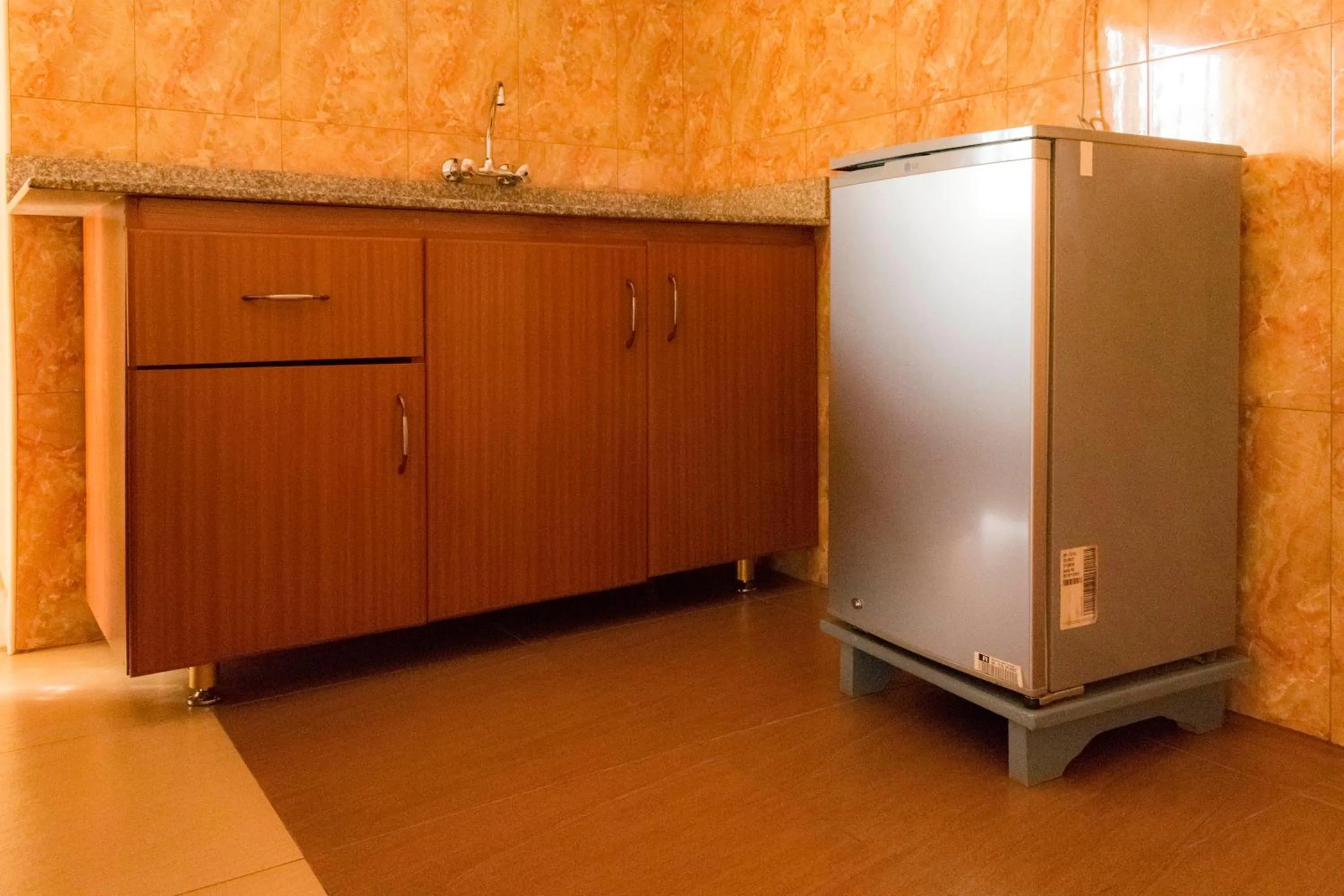 Kitchen or kitchenette in Olina Hotel and Apartments Kampala