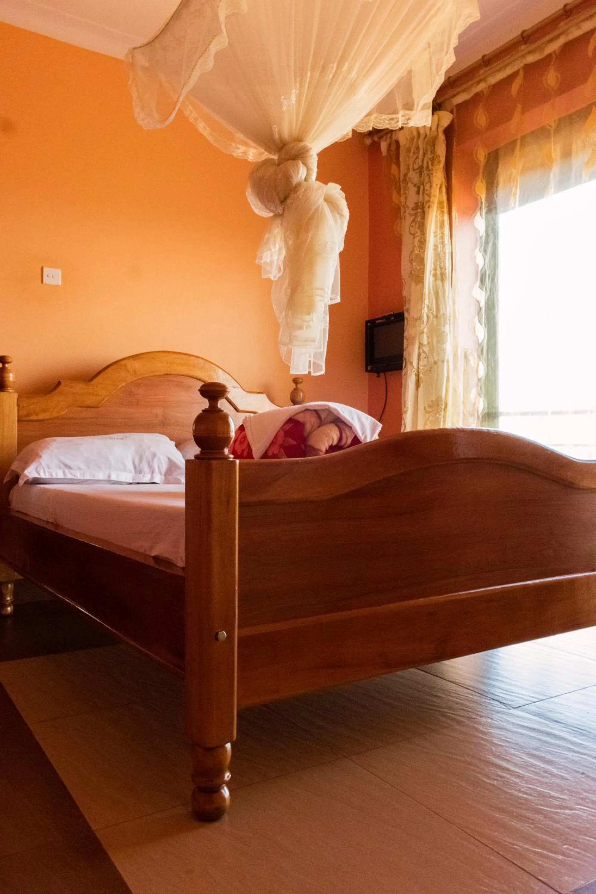 Bed in Olina Hotel and Apartments Kampala