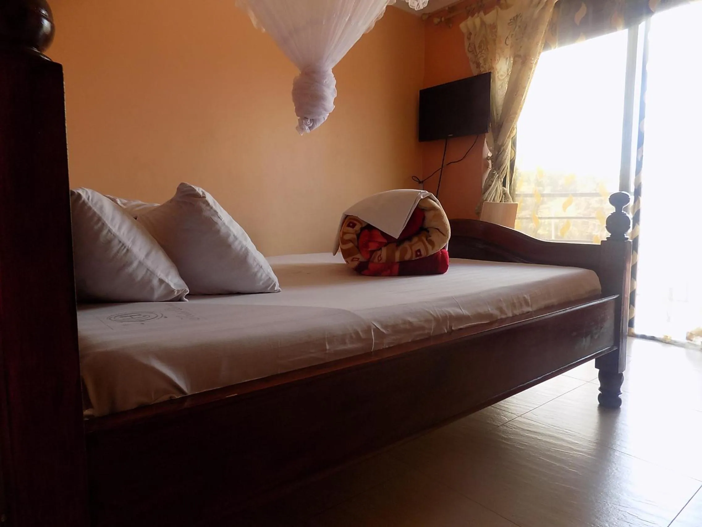 Bedroom in Olina Hotel and Apartments Kampala