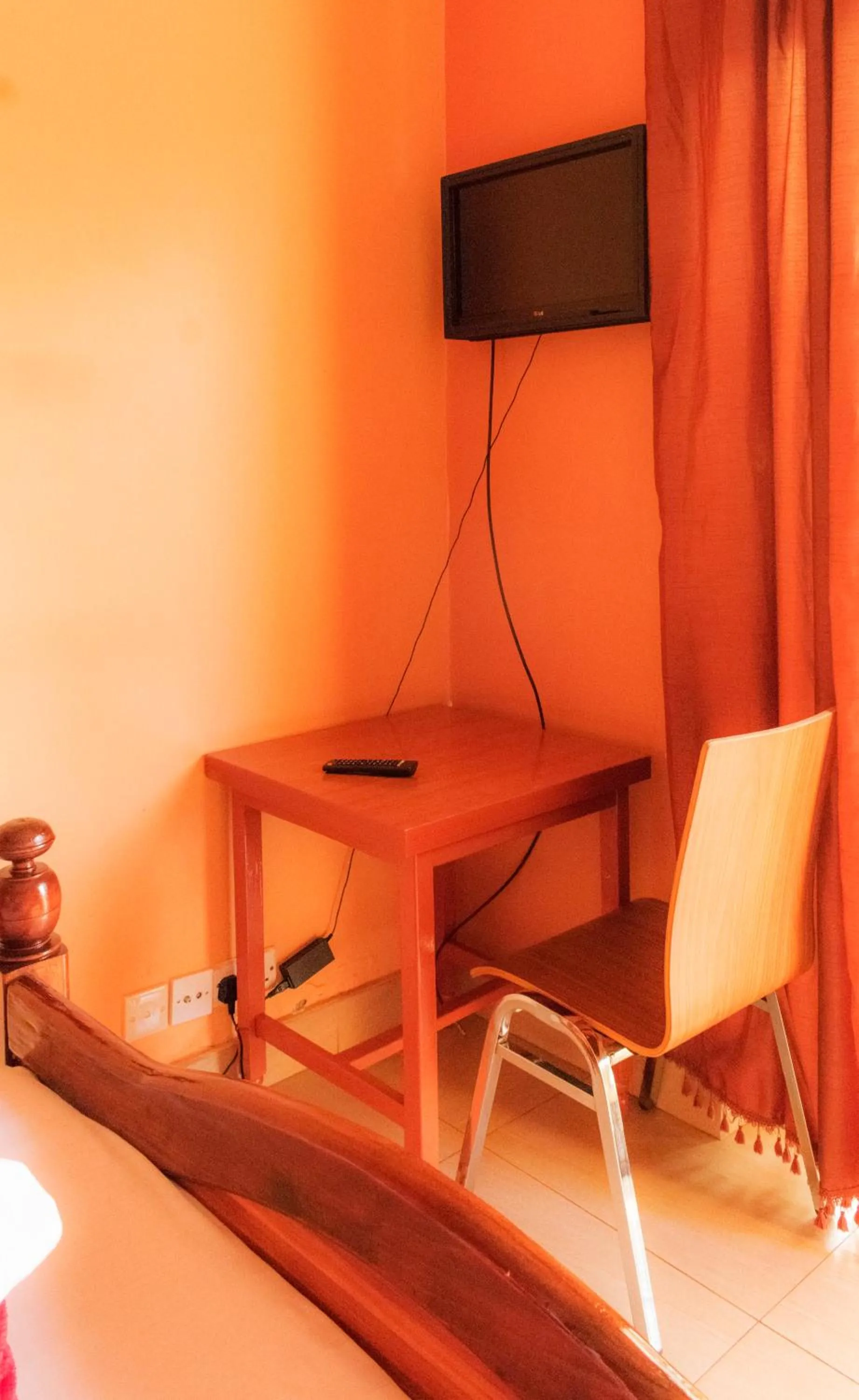 TV and multimedia in Olina Hotel and Apartments Kampala
