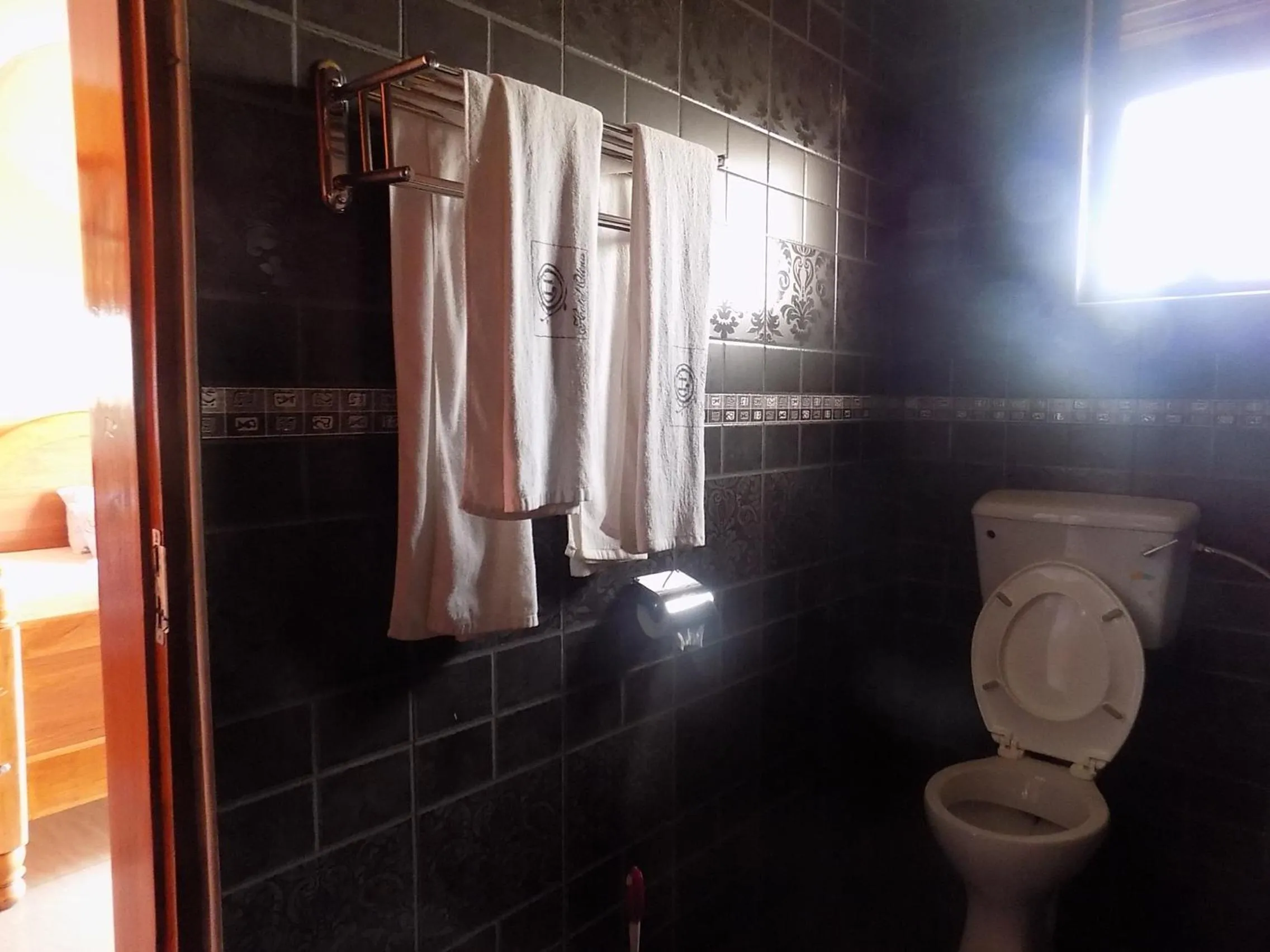 Bathroom in Olina Hotel and Apartments Kampala