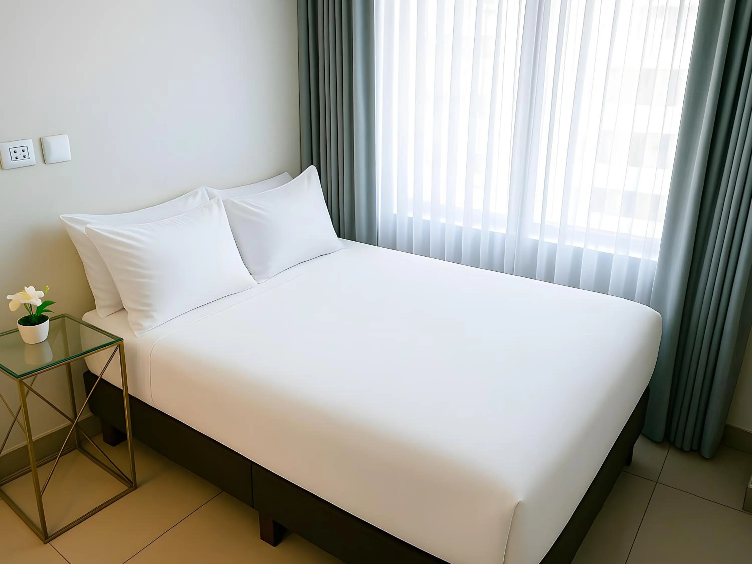 Bed in Apart Hotel Petit Palace Suites