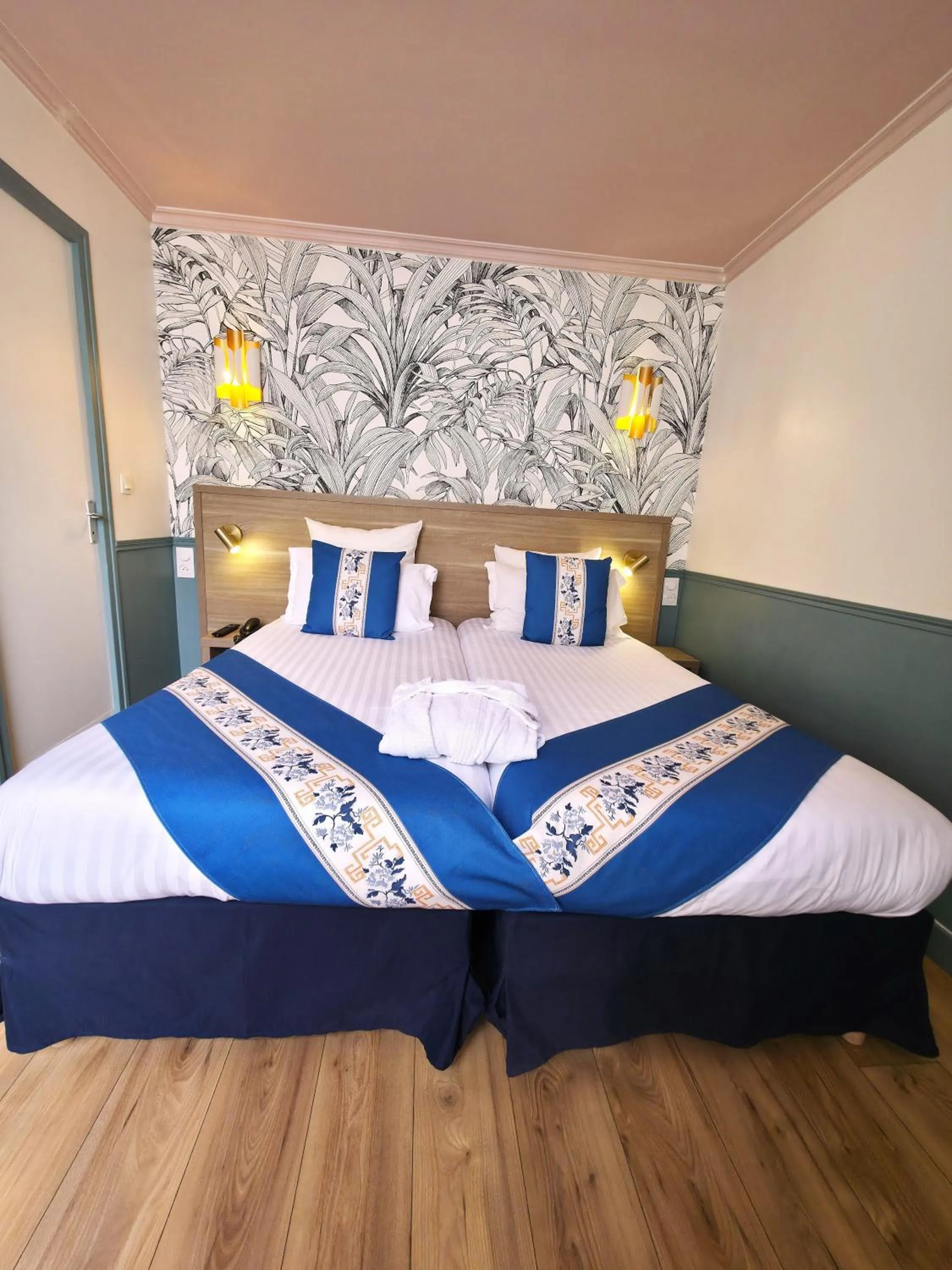 Bed in Amadeus Hotel