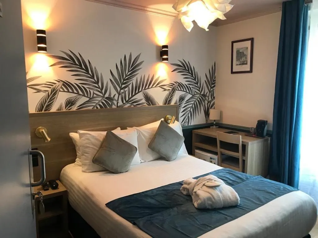 Bed in Amadeus Hotel