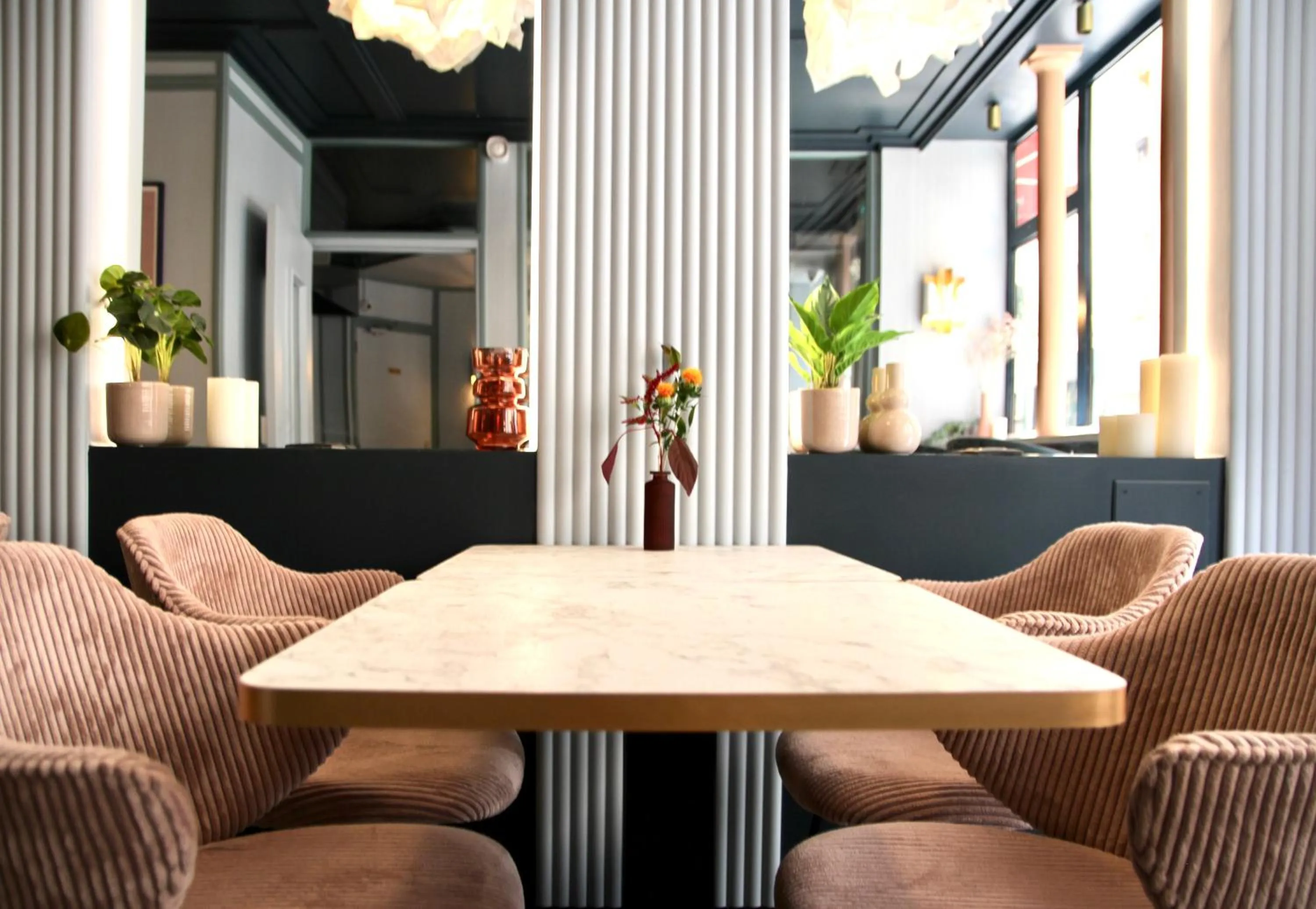 Communal lounge/ TV room in Amadeus Hotel