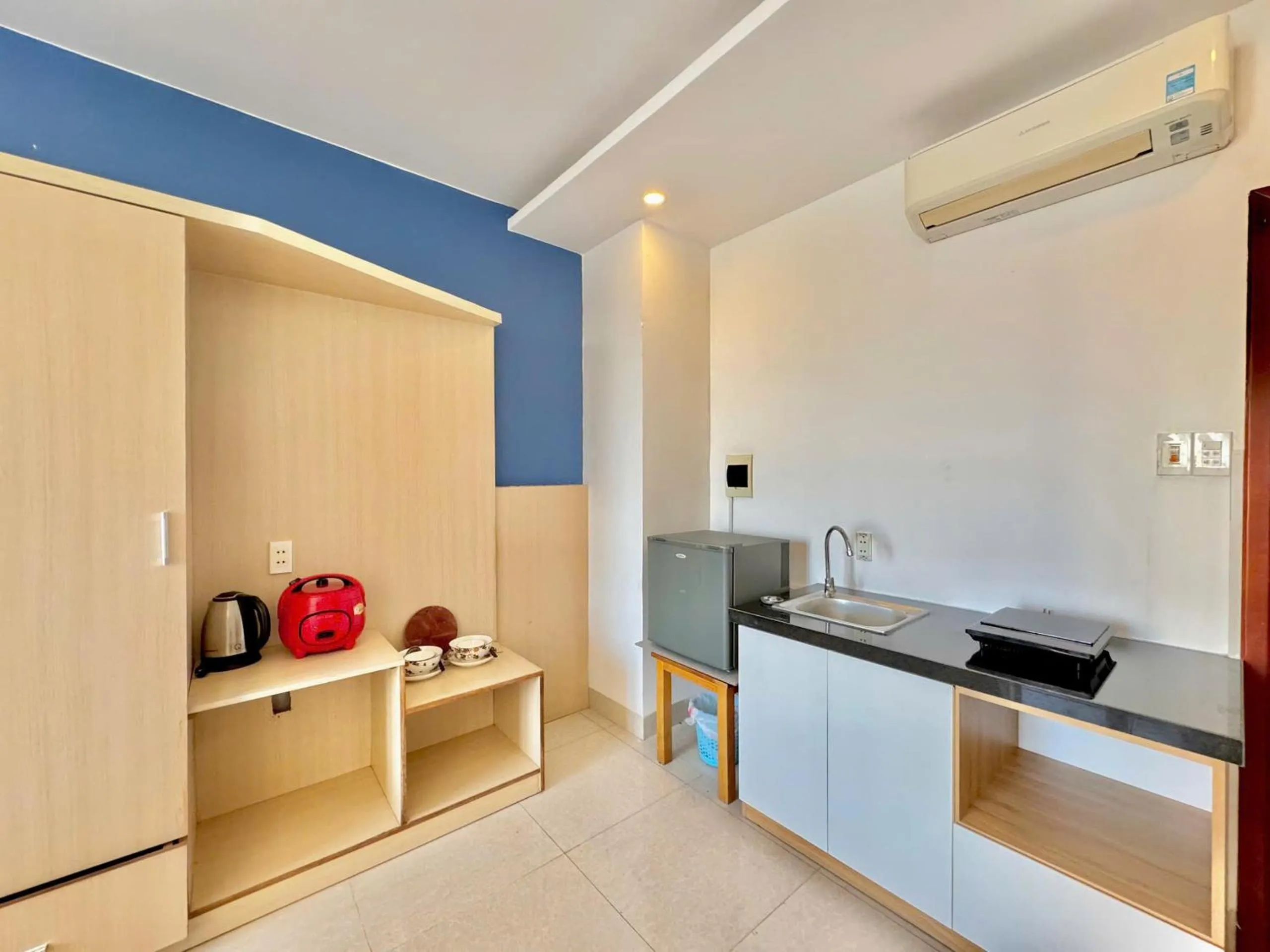 stove in Maxhome Luxury Hotel