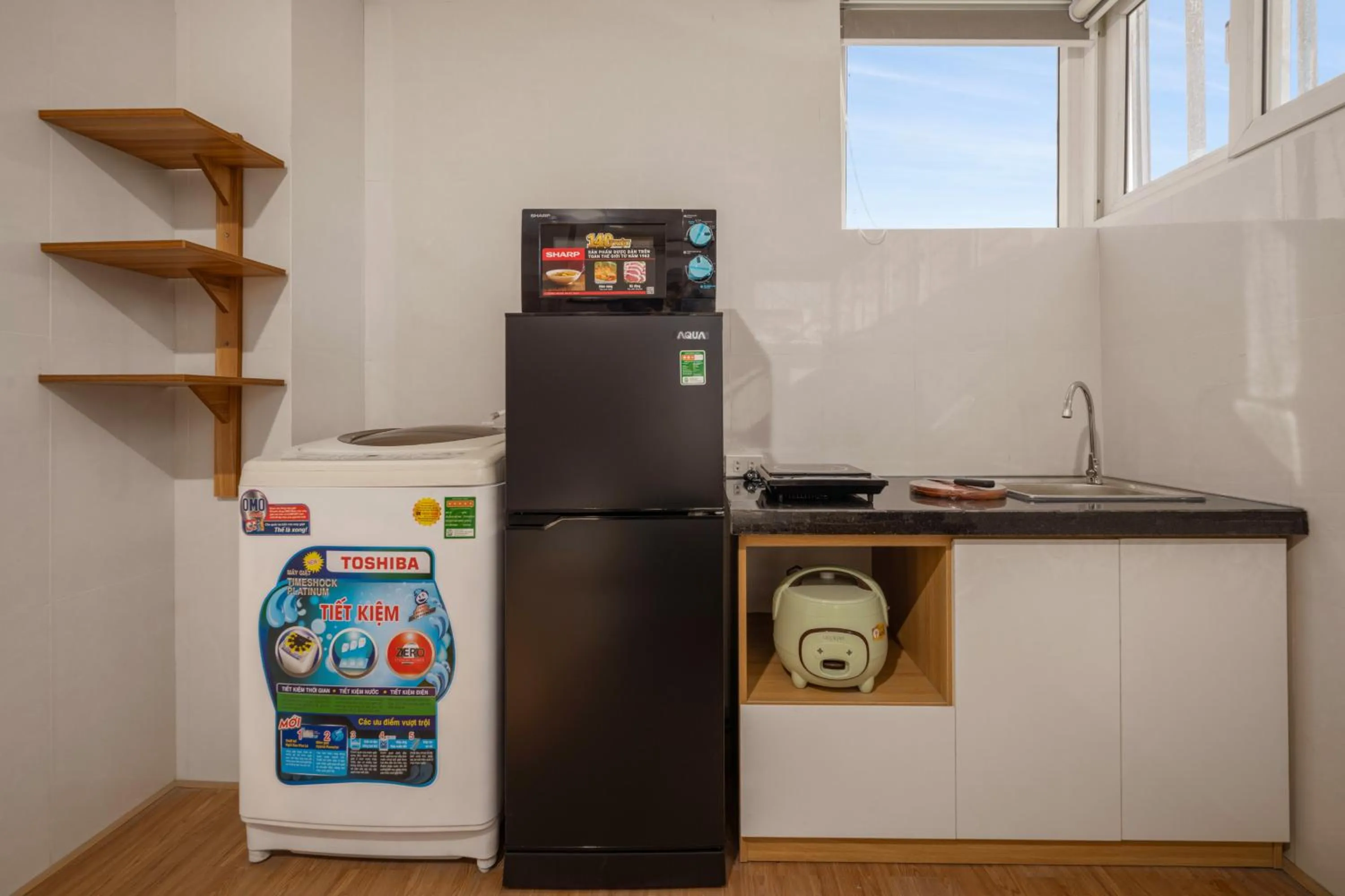 Kitchen or kitchenette in Maxhome Luxury Hotel