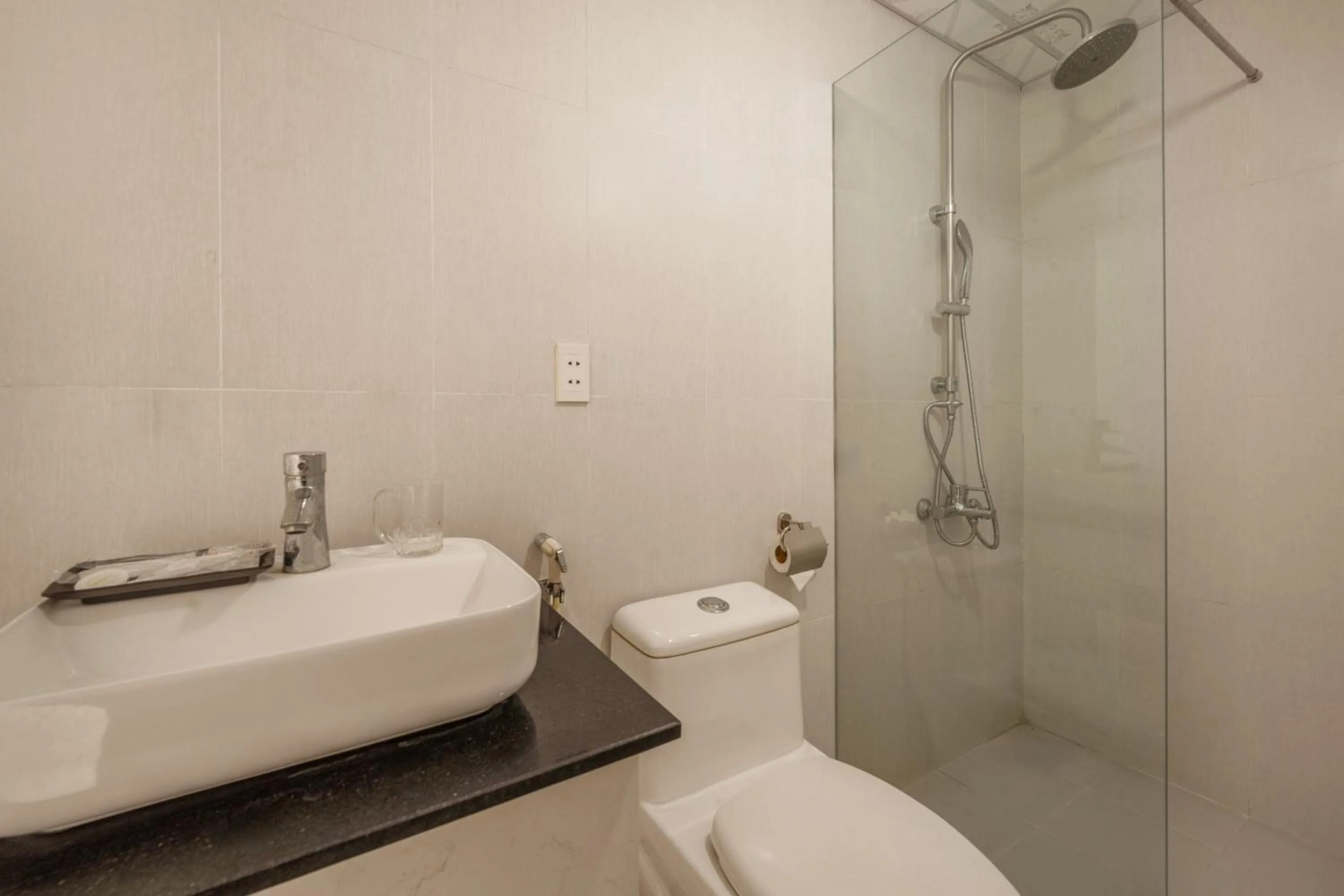 Bathroom in Maxhome Luxury Hotel