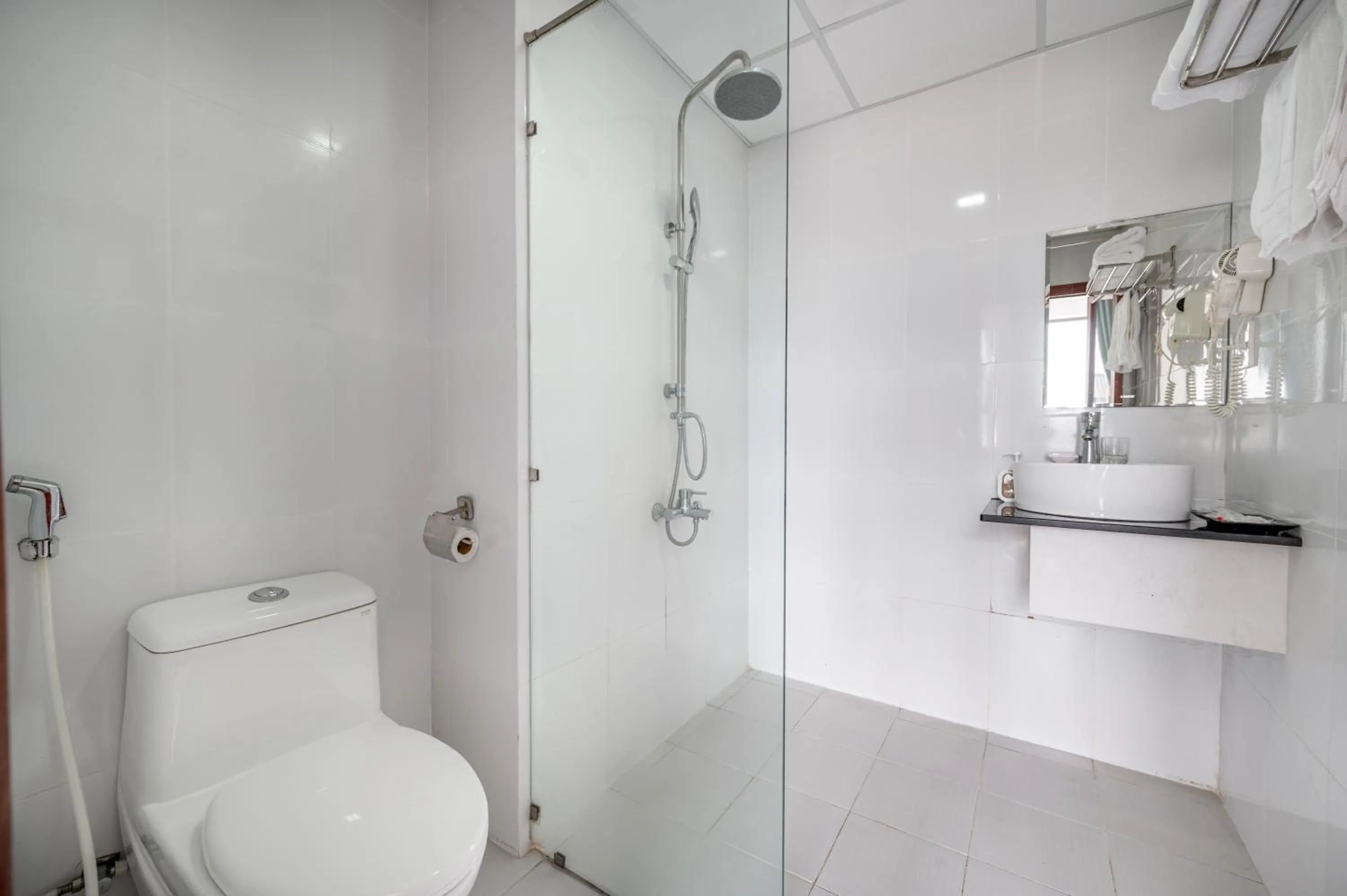 Bathroom in Maxhome Luxury Hotel