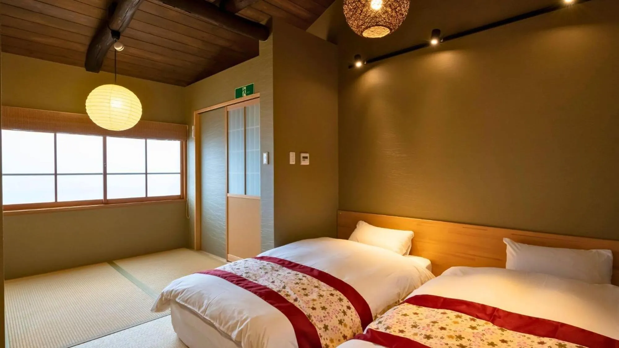 Bed in 京一軒町家 さと居 香雪 SATOI KOSETSU Shichijo-Mibu