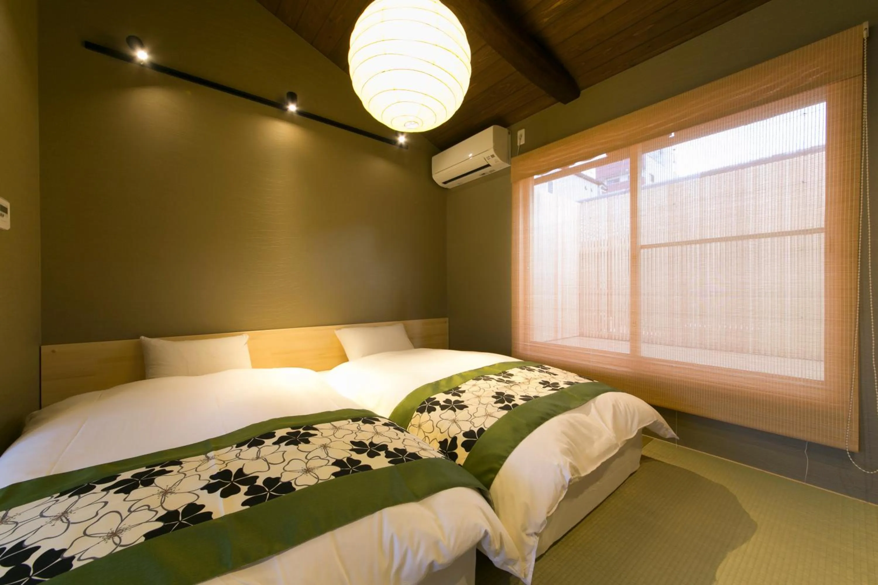 Bedroom, Bed in 京一軒町家 さと居 香雪 SATOI KOSETSU Shichijo-Mibu