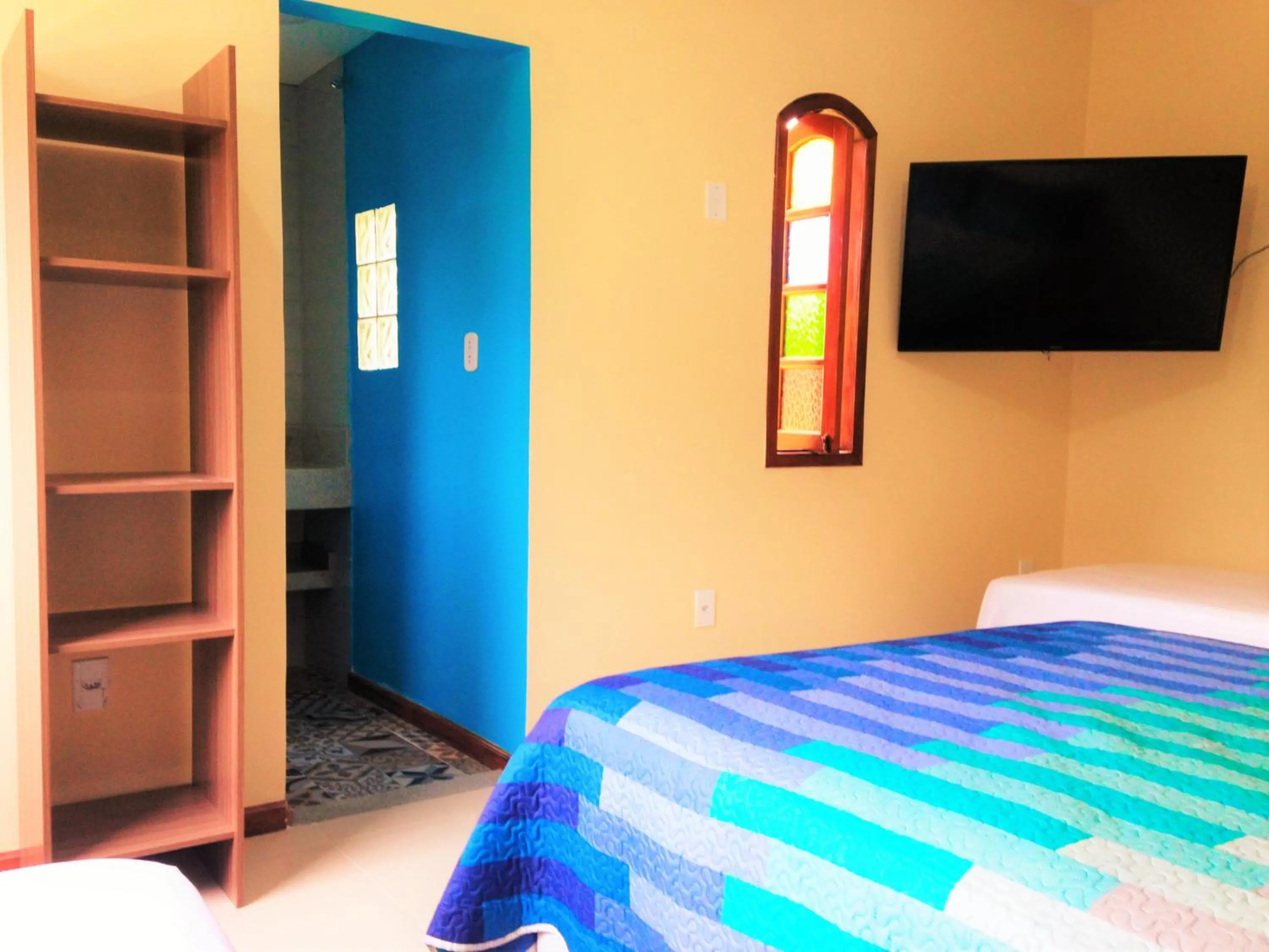 Photo of the whole room, Bed in Pousada Paraíso de Itaúna