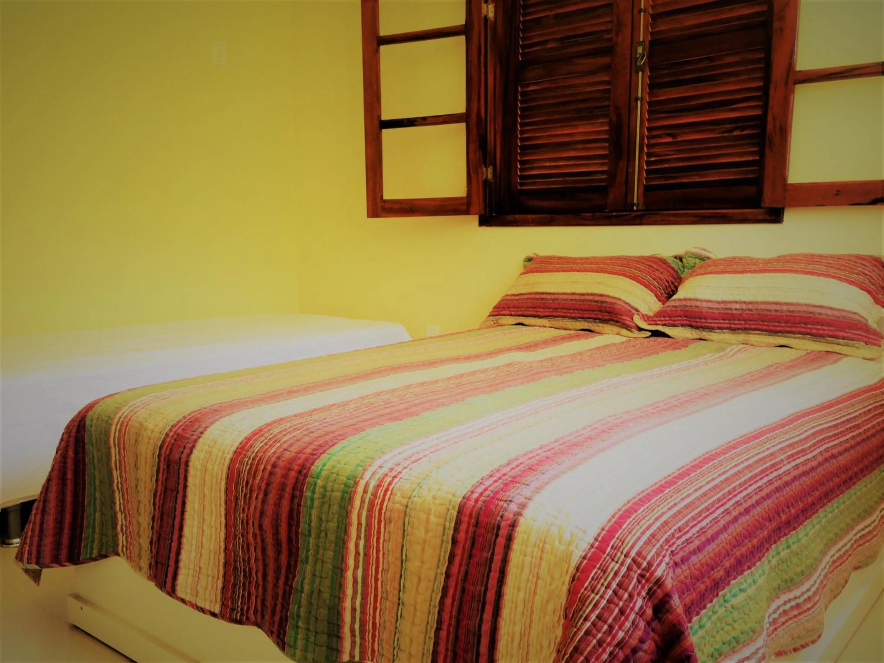 Photo of the whole room, Bed in Pousada Paraíso de Itaúna
