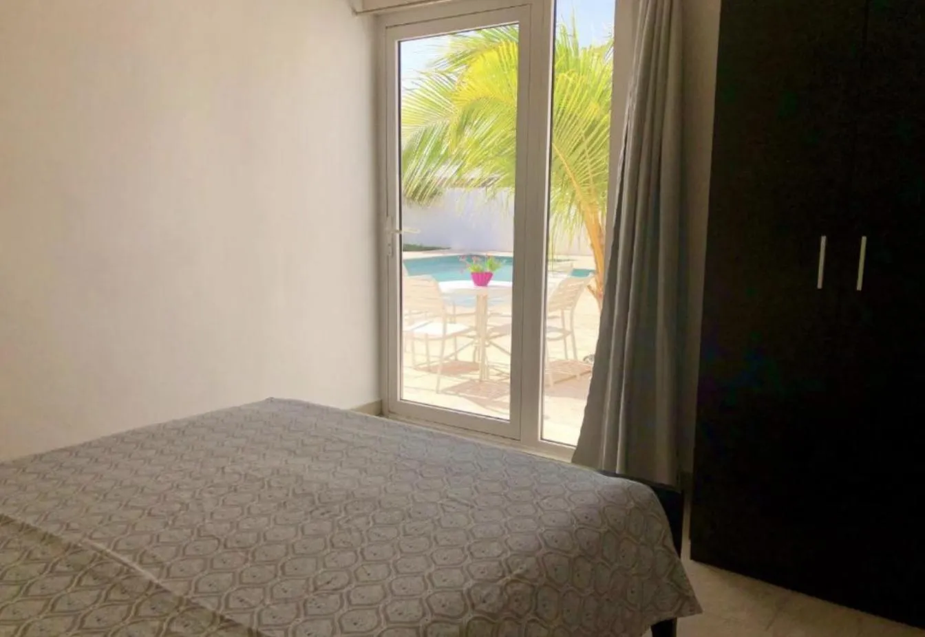 Bed in Genesis Apartments