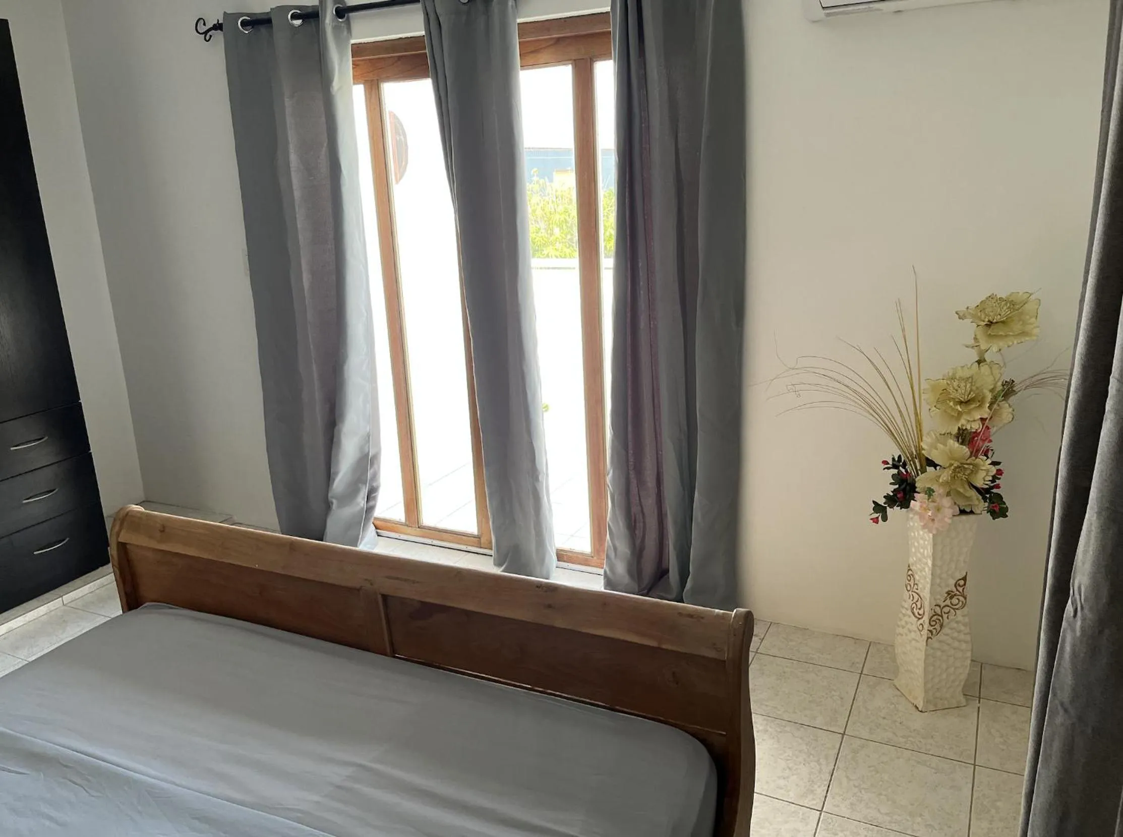 Bed in Genesis Apartments