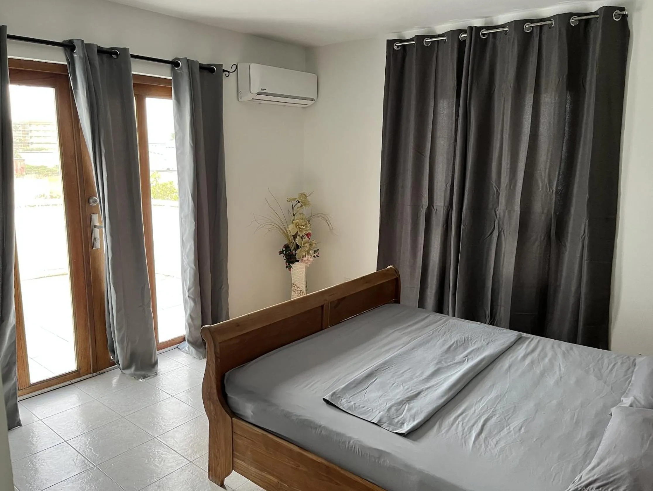 Bed in Genesis Apartments