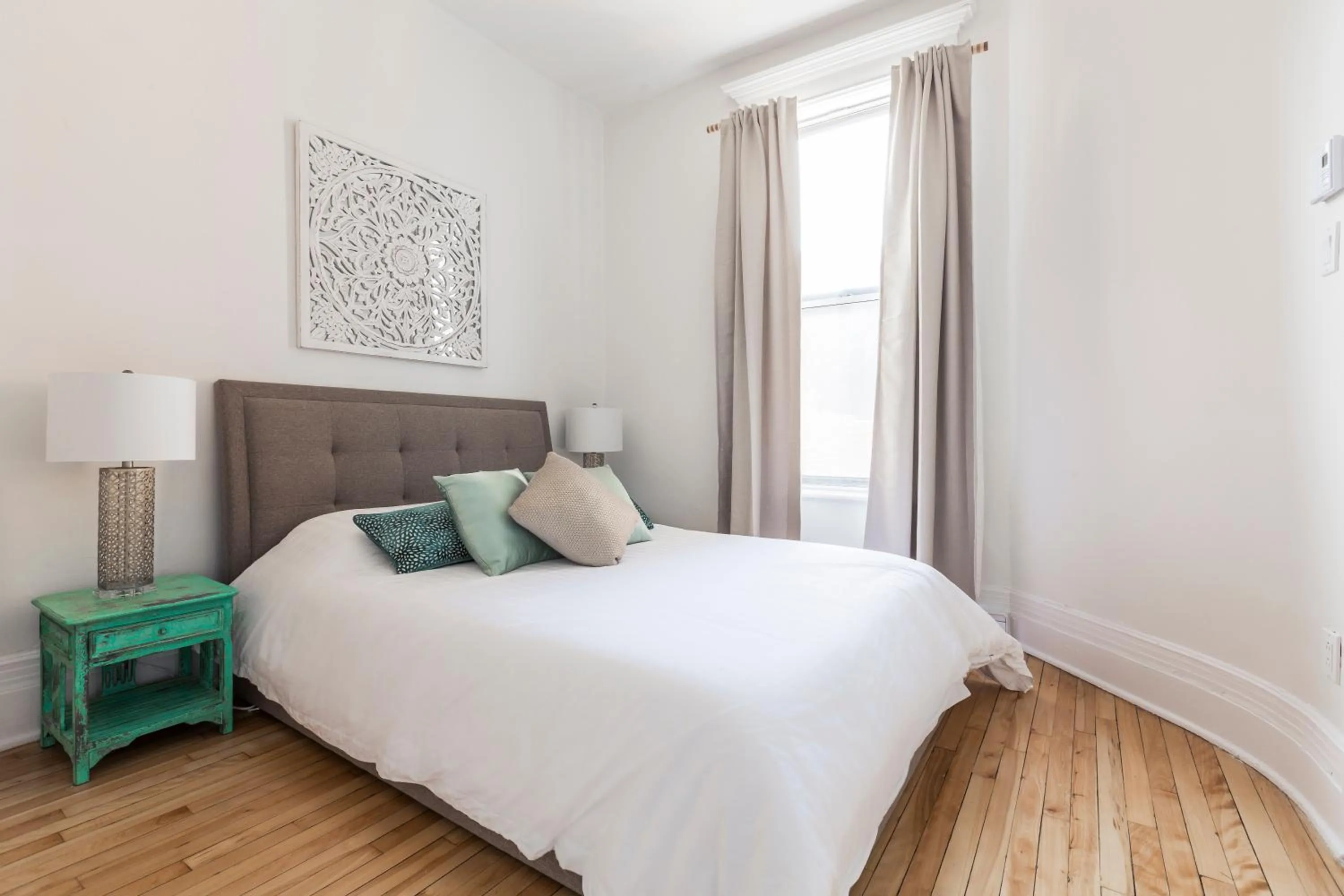 Bed in MTLVacationRentals -The Chic Laurier