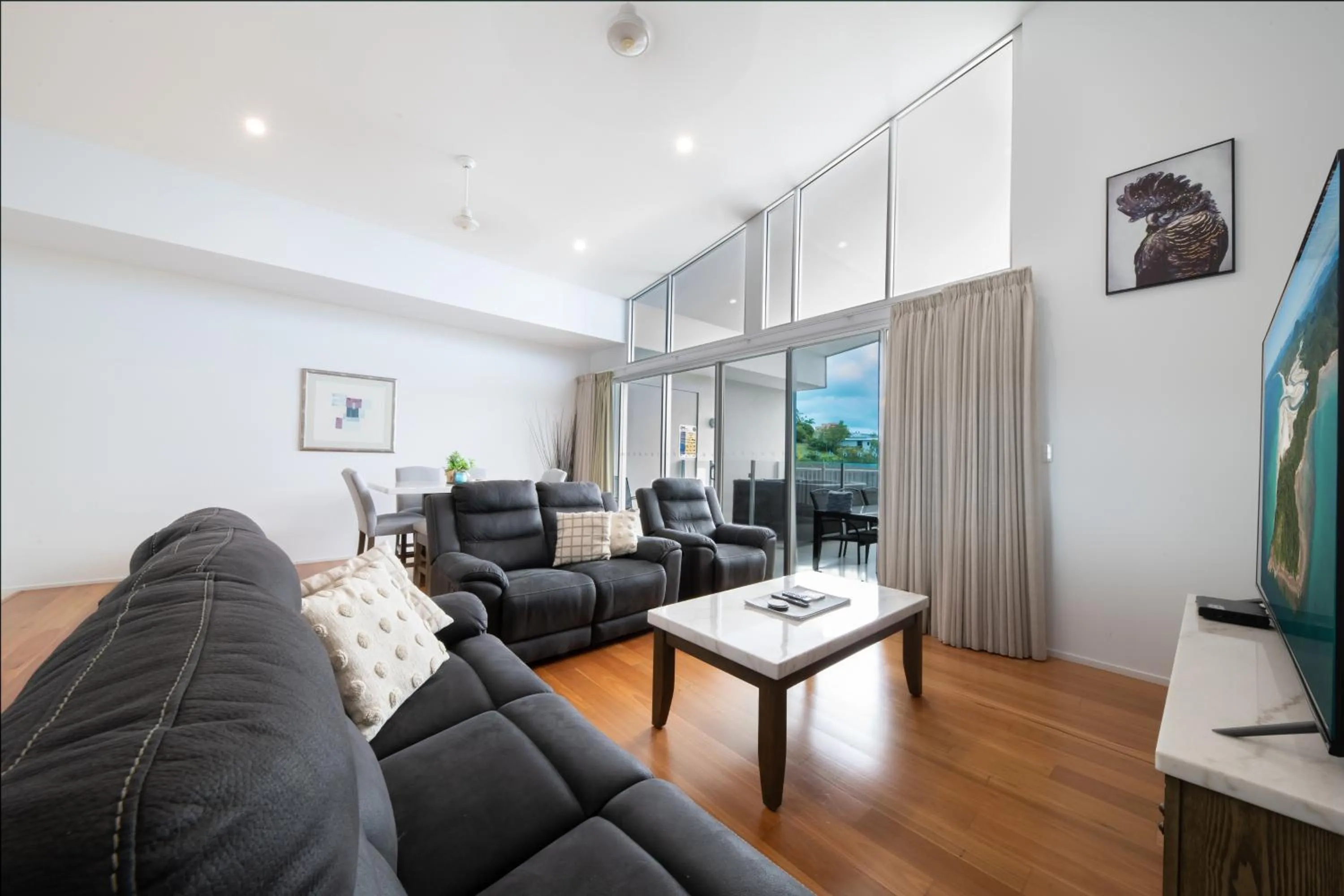 Communal lounge/ TV room in Azure Sea Whitsunday Resort