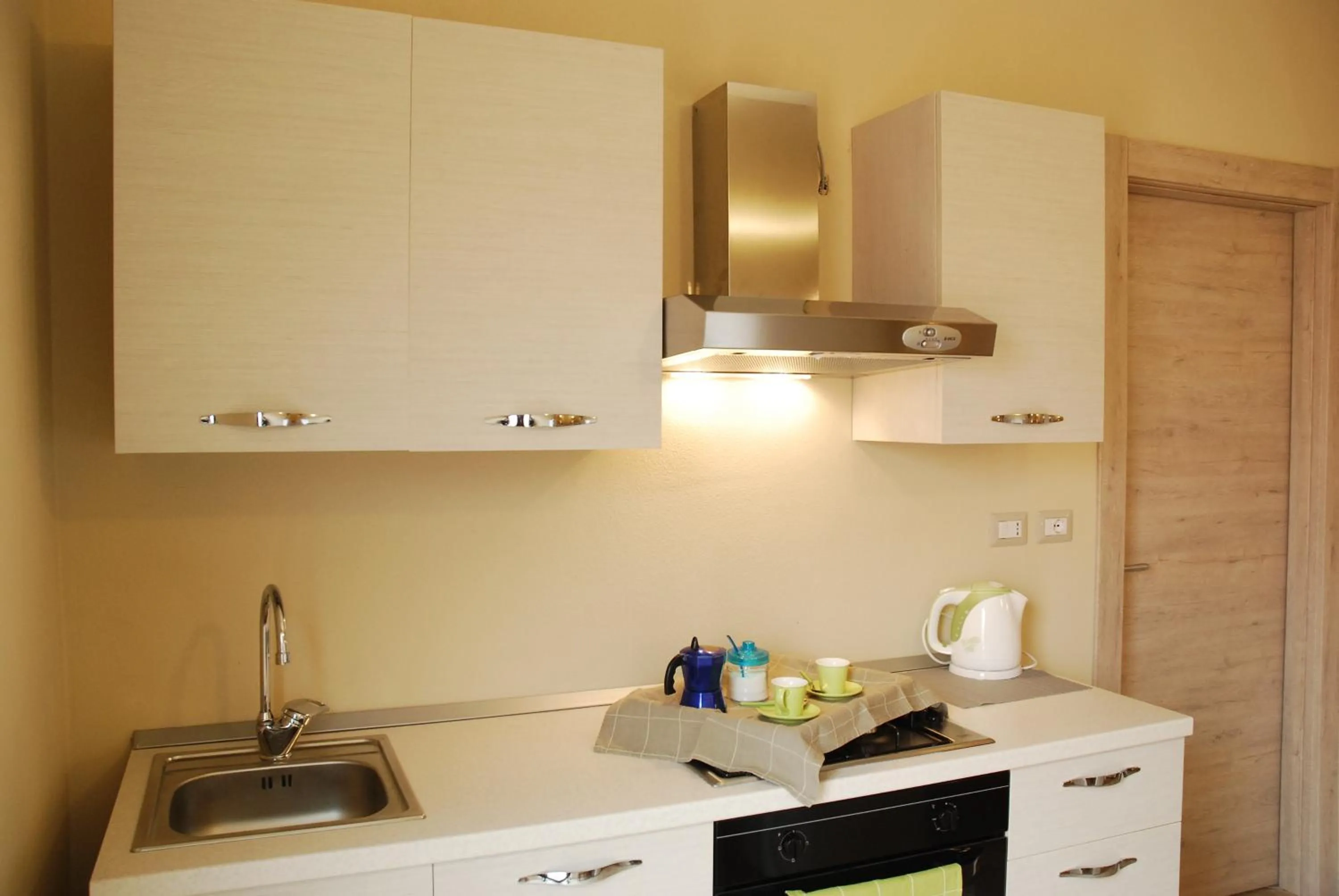 Kitchen or kitchenette in Alba Sarda Residence