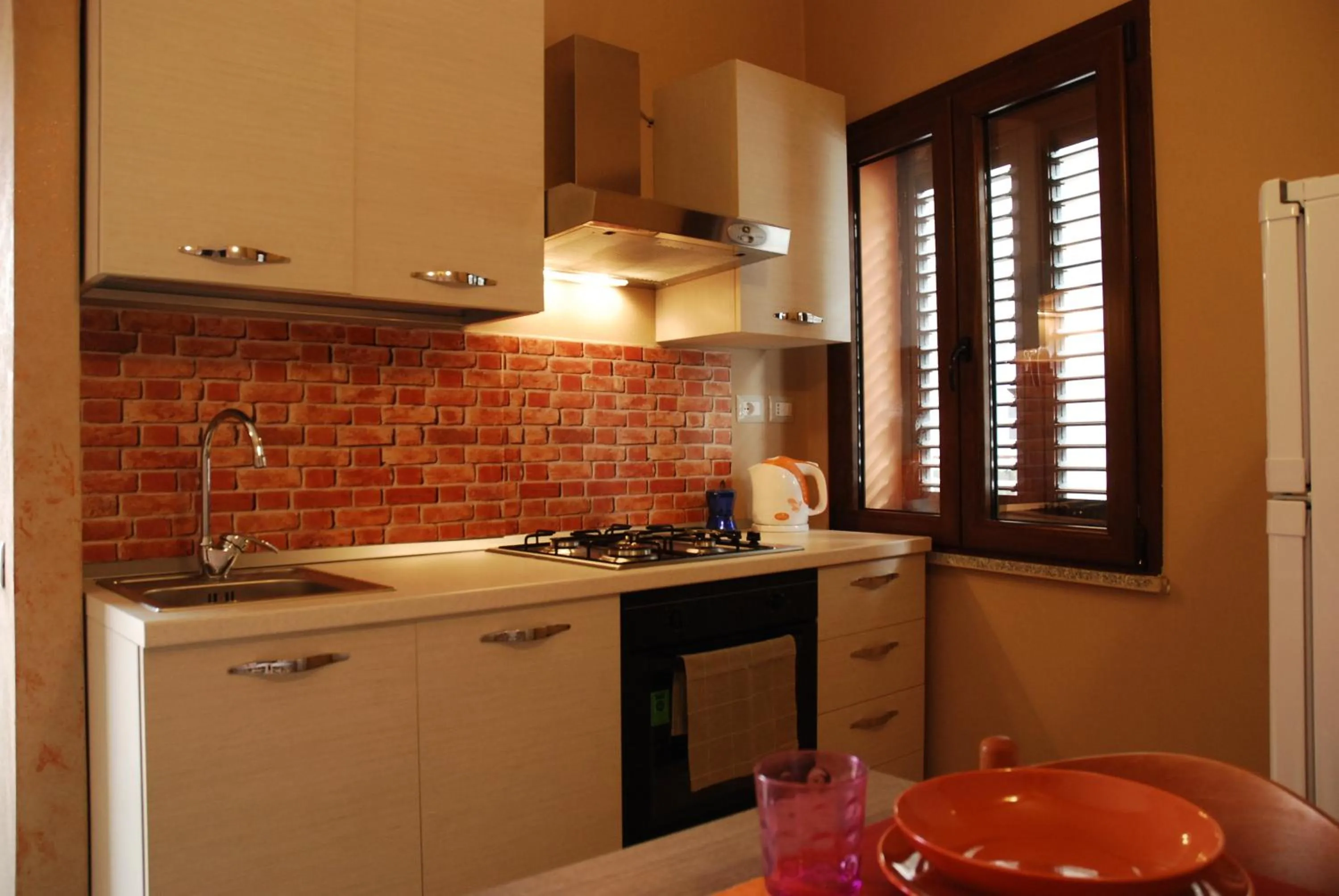 Kitchen or kitchenette in Alba Sarda Residence