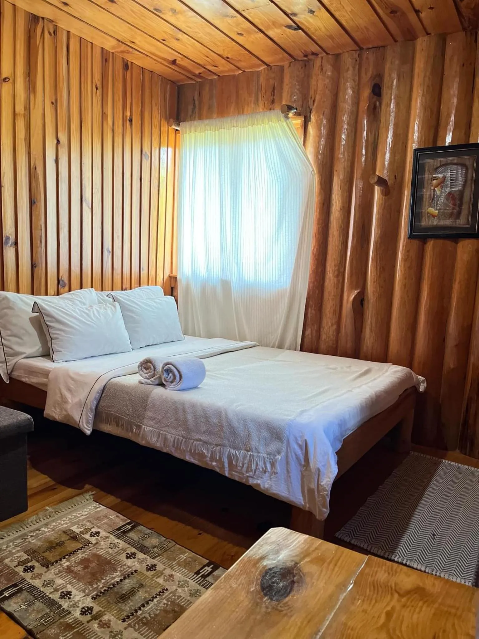 Bed in Agape Log Cabin