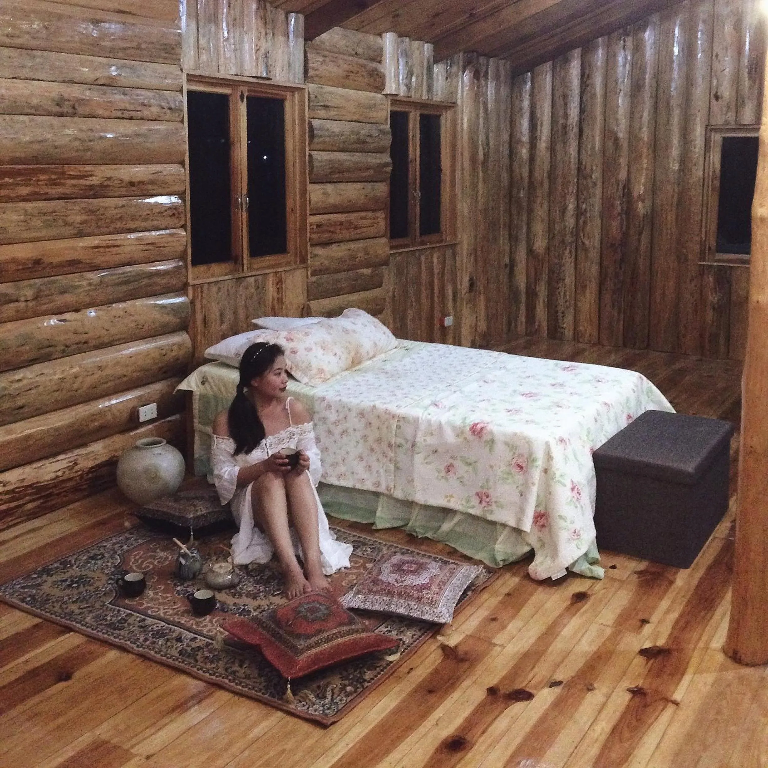 Decorative detail, Bed in Agape Log Cabin