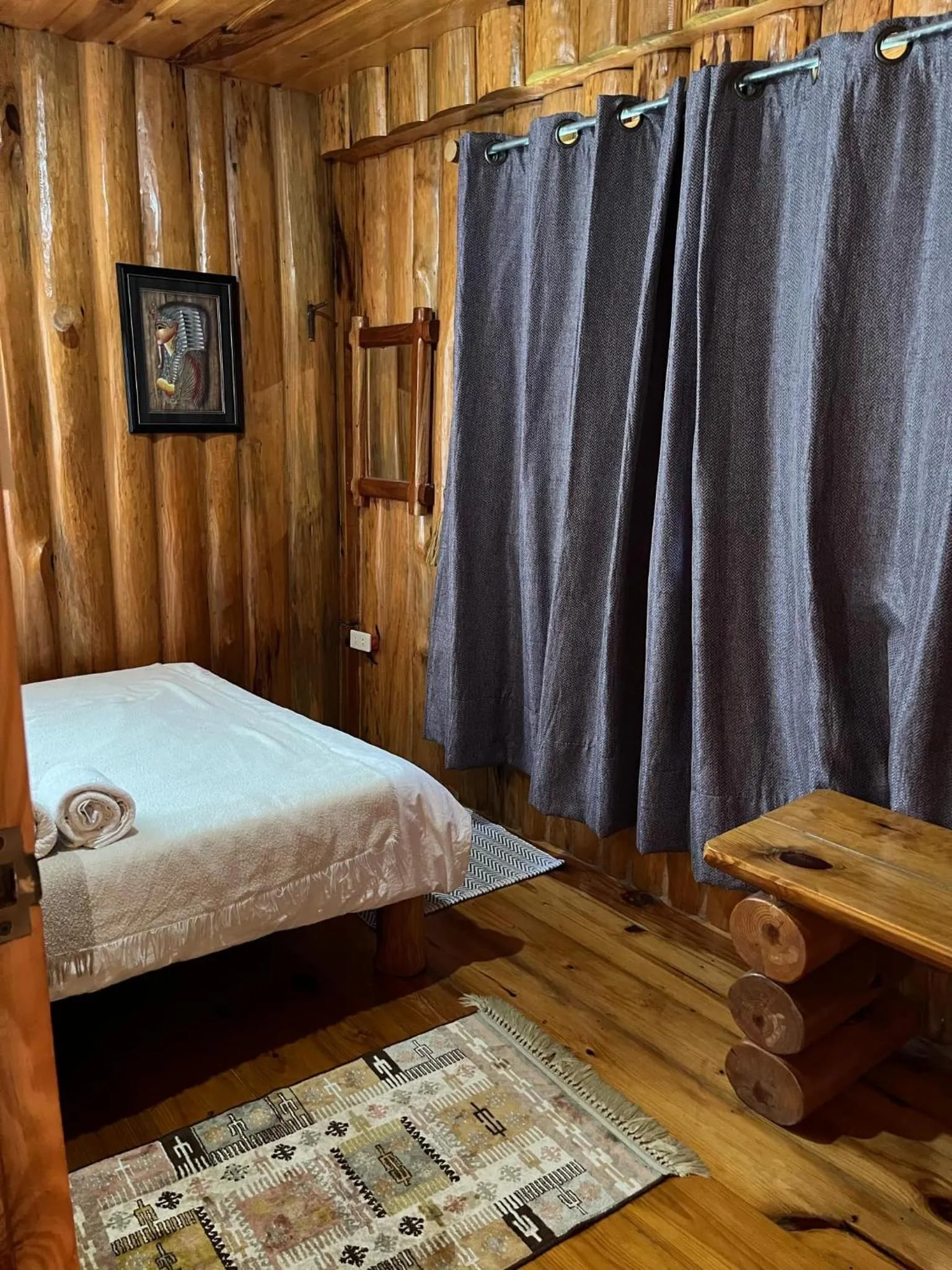 Bed in Agape Log Cabin