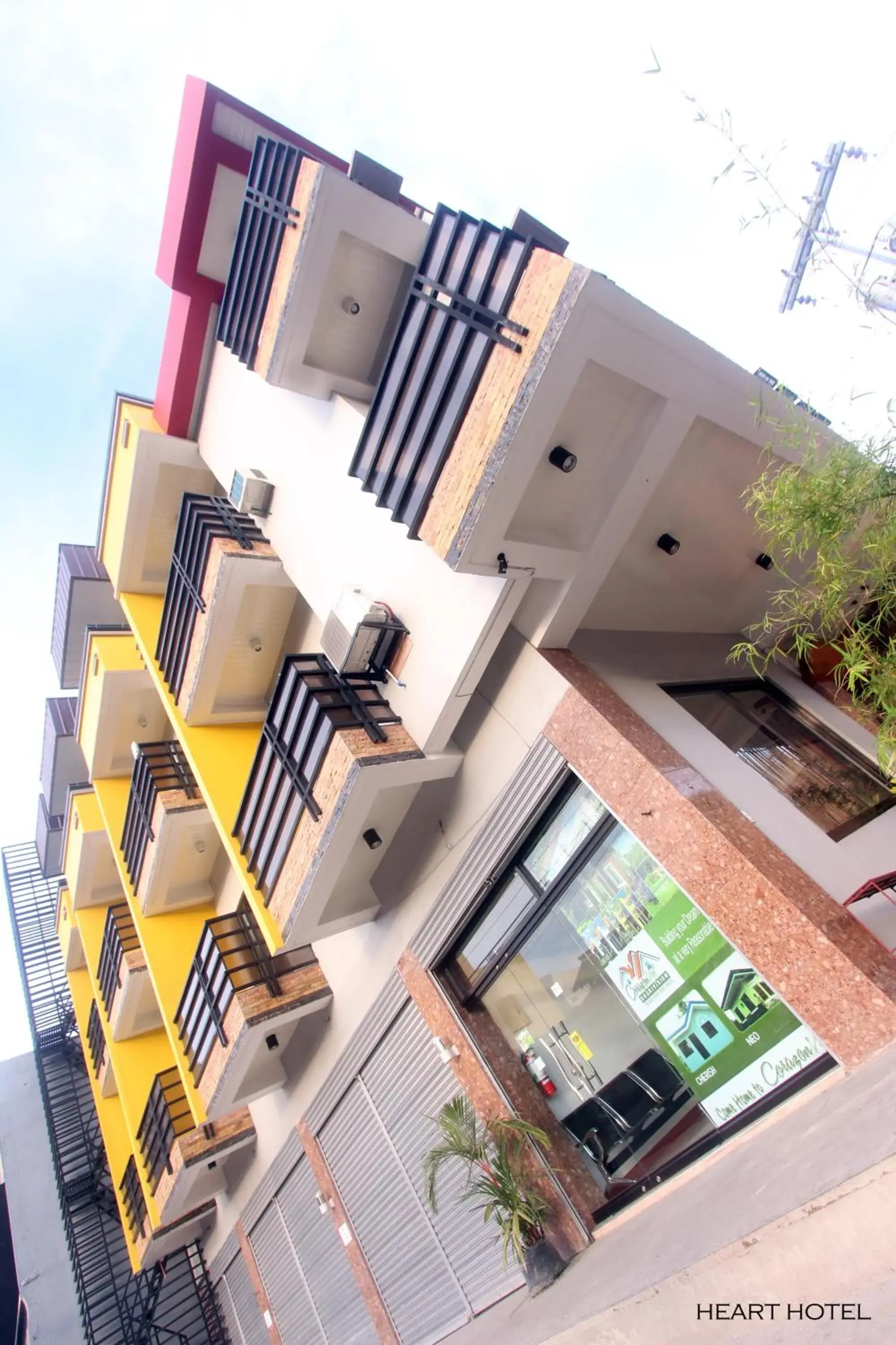 Facade/entrance in Heart Hotel and Services Facade/entrance in Heart Hotel and Services