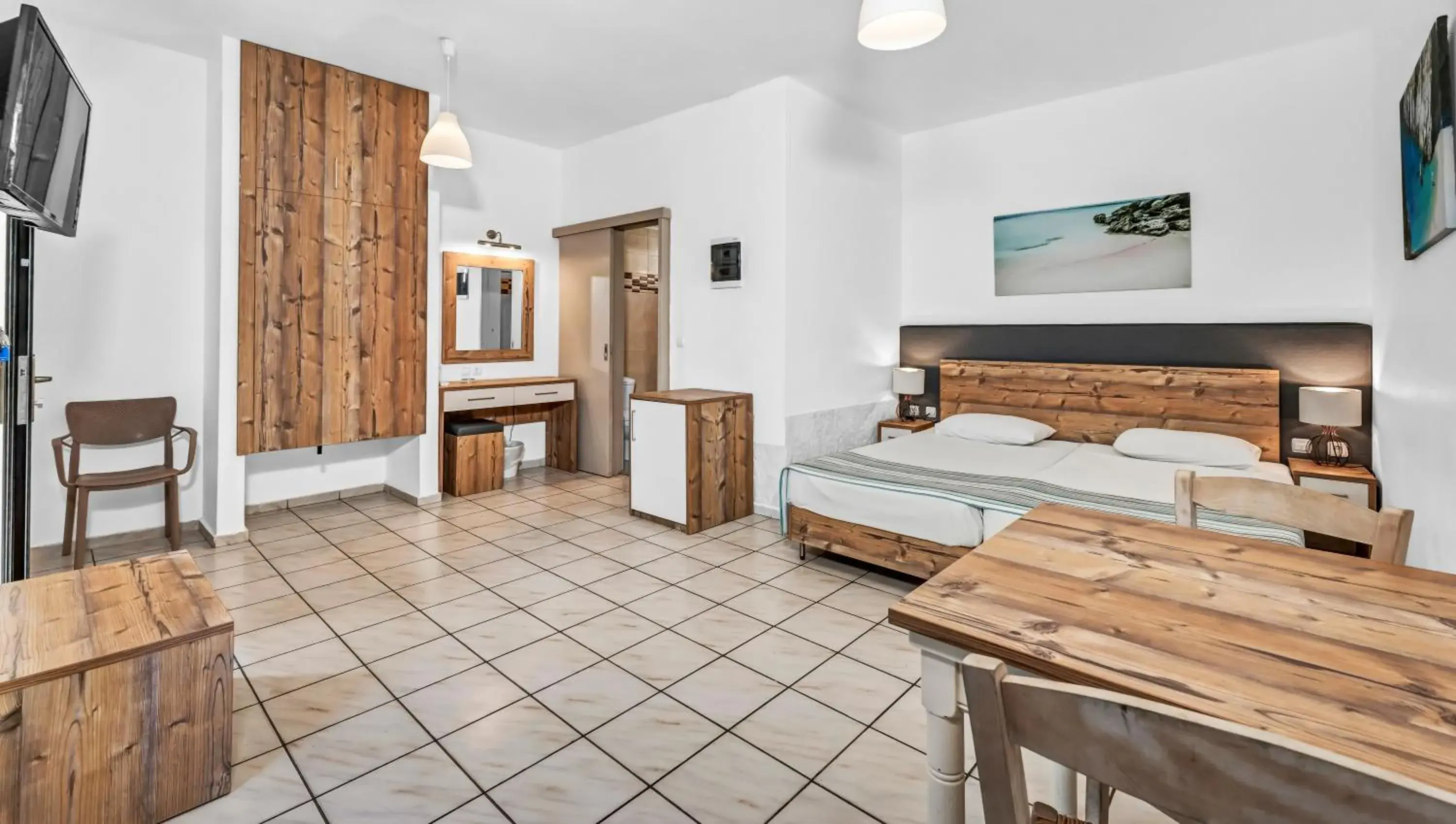 Triple Room Garden View in Almare Beach Triple Room Garden View in Almare Beach