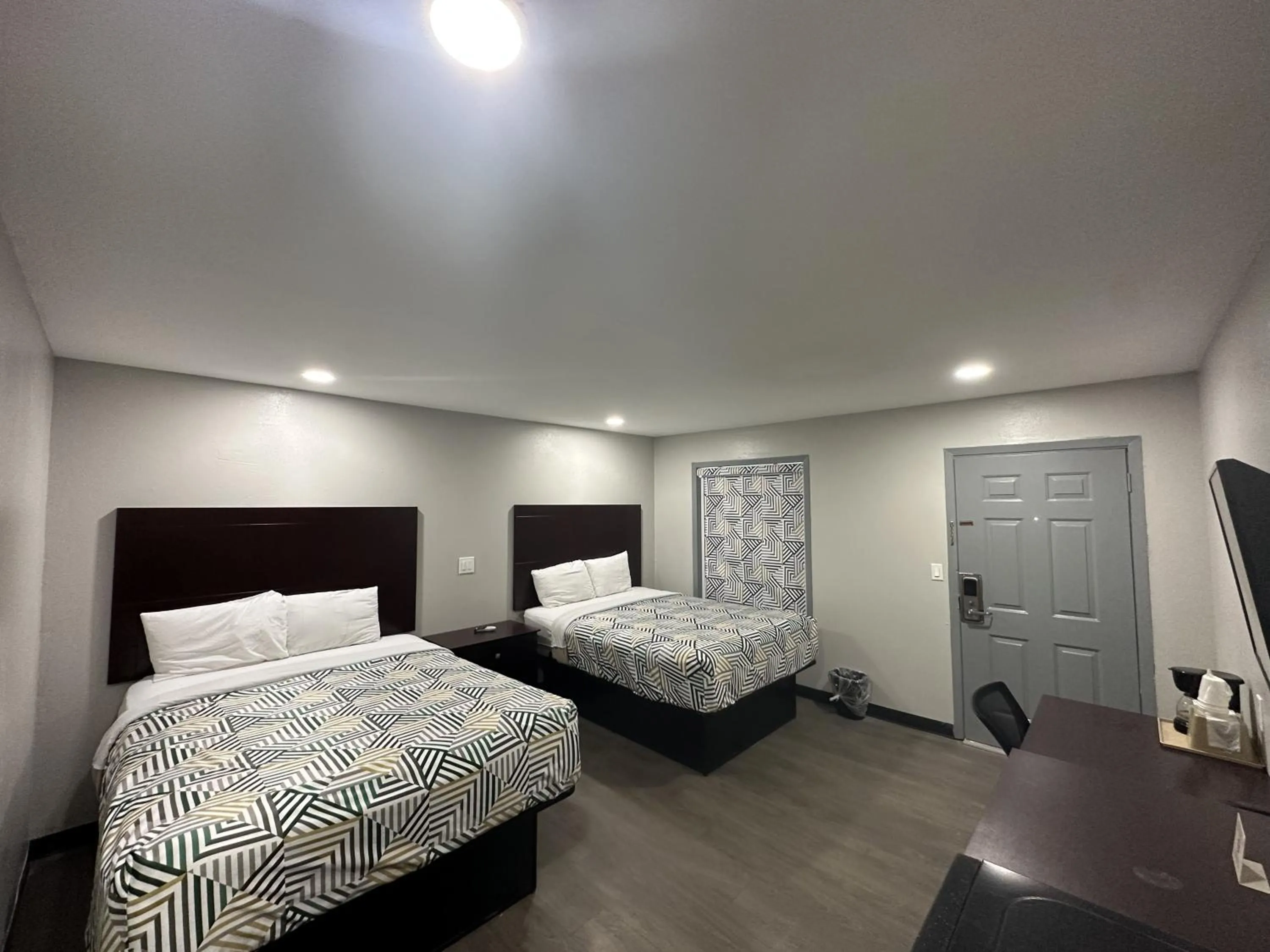 Bed in Relax Inn Mcgehee